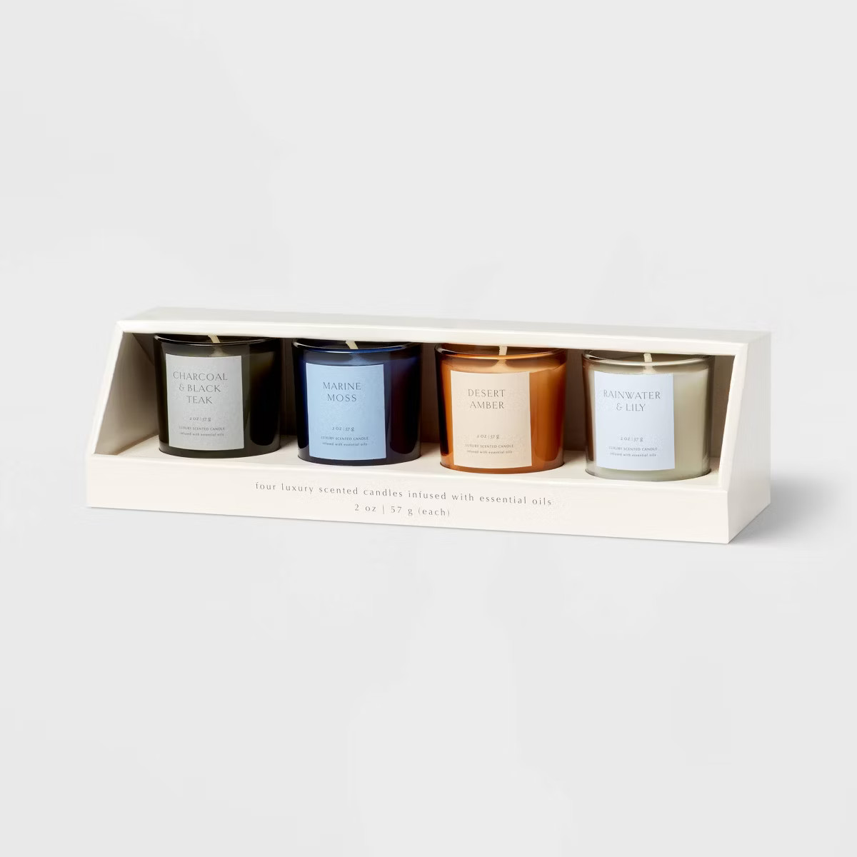 4pk Candle Gift Set Rainwater Lily + Marine Moss + Desert Amber + Charcoal Black Teak - Threshold... | Target
