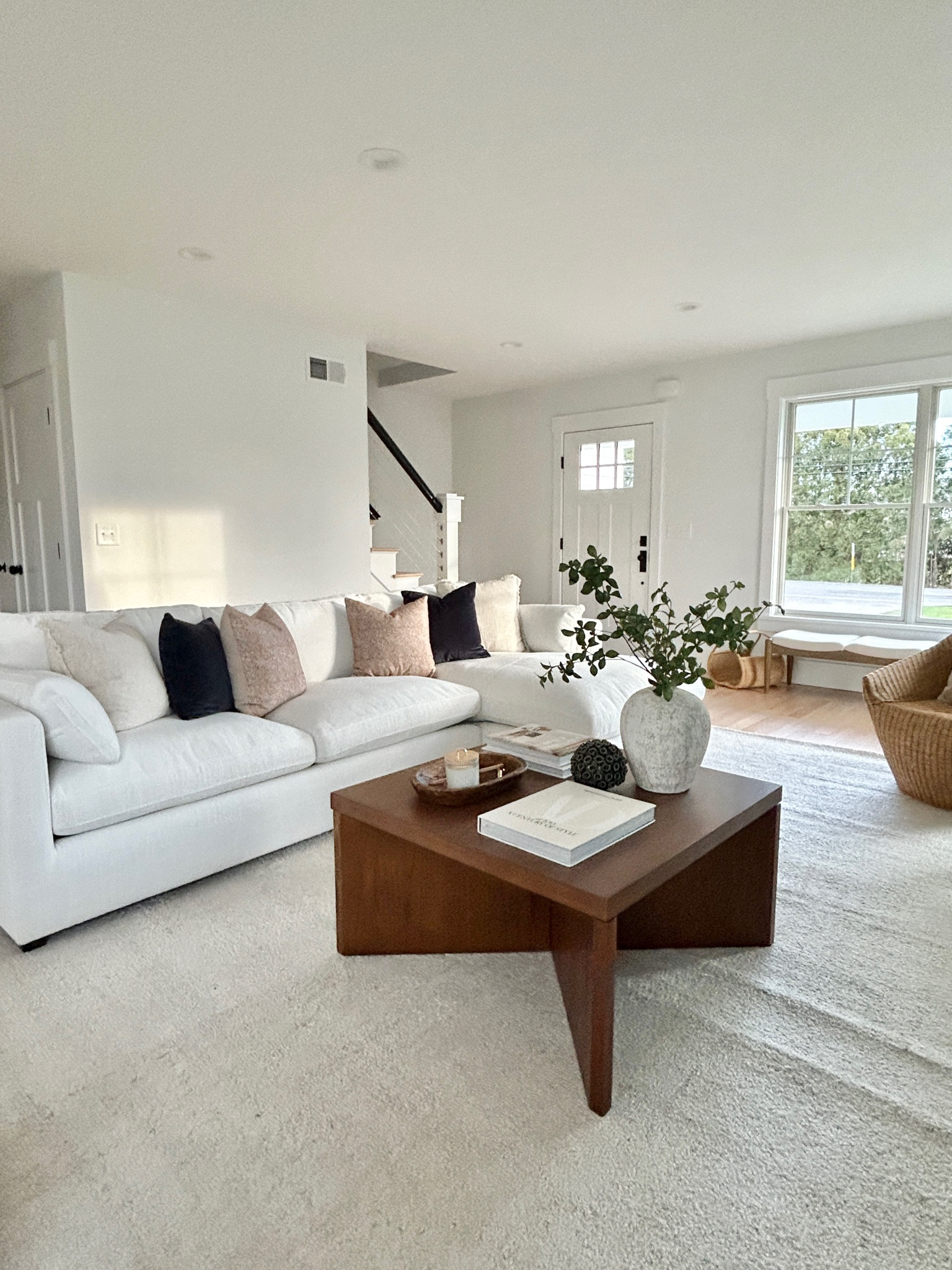 Large square coffee table. Cozy sectional with navy velvet pillows.

#livingroom #homedecor

#LTKHome