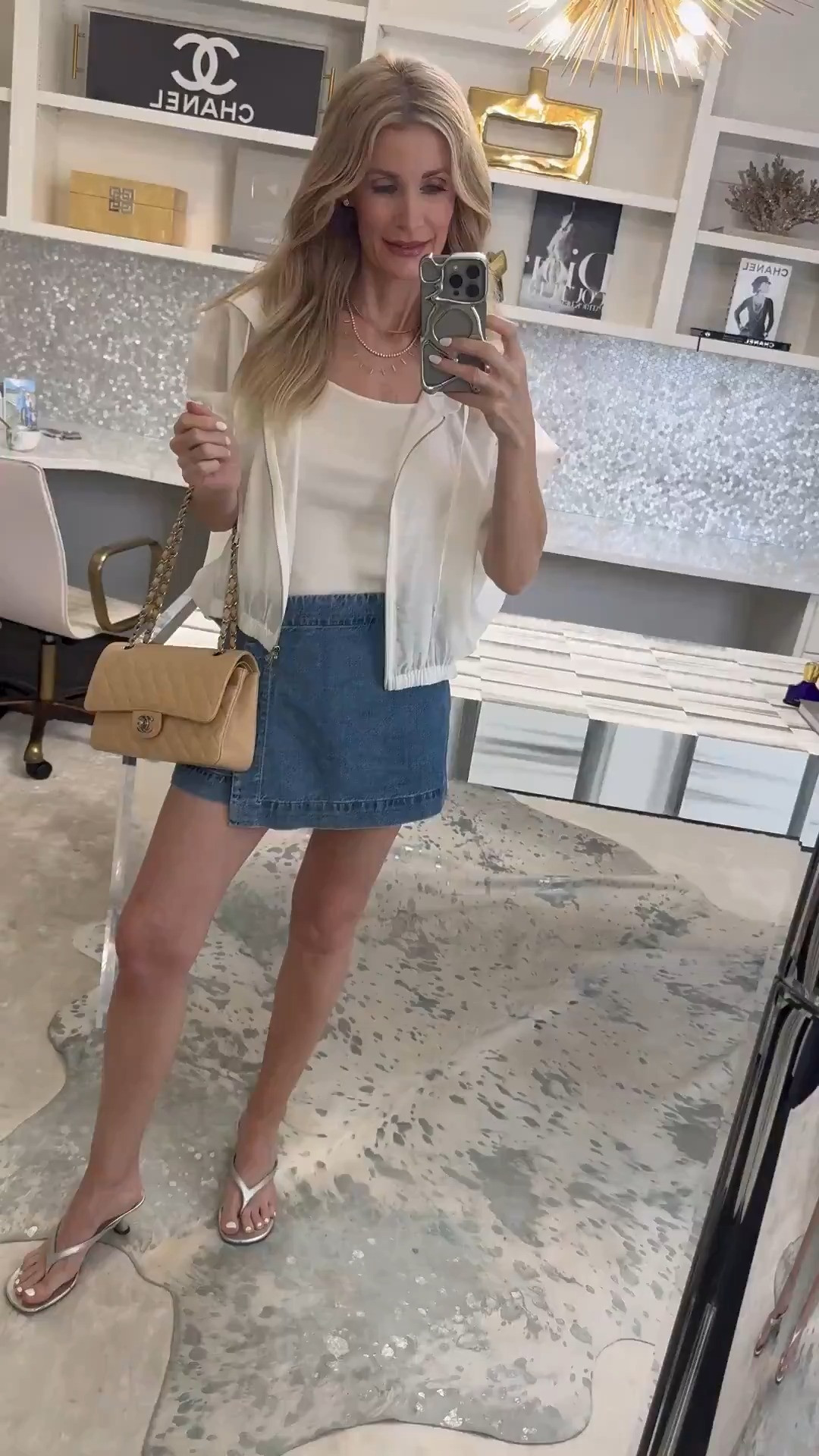 Casual summer outfit featuring this Madewell denim skort and lightweight sheer bomber jacket ✨ Love that the skort looks like a skirt but has shorts underneath for an easy warm-weather look. Size 24 in skort and XS in jacket. #DenimSkort #SummerStyle 

#LTKOver40#LTKSeasonal#LTKSeasonal#LTKOver40 

 

#LTKootd #LTKootd