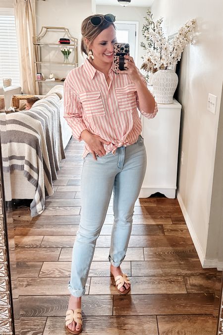 Amazon bestsellers: Spring outfits. vacation looks. Casual Easter outfit. Amazon sunglasses. High waisted denim.

Wearing a 28 reg in Levi slim straight jeans, M in pink striped button down, and 7.5
 In rattan slide sandals. All run true to size. Amazon fashion finds. Mom style. Spring tops. Summer outfit. 

#LTKFind #LTKunder50 #LTKSeasonal