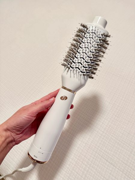 My new favorite hair tool! Upgraded my styling brush 🙌🏼 3 different heat and 2 separate speed settings. Doesn’t overheat like other dryer brushes, and less bulky than the black dryer brush. Win!

Hair tools 
Hair style
Hair dryer
T3
Beauty

#LTKGiftGuide #LTKstyletip #LTKbeauty