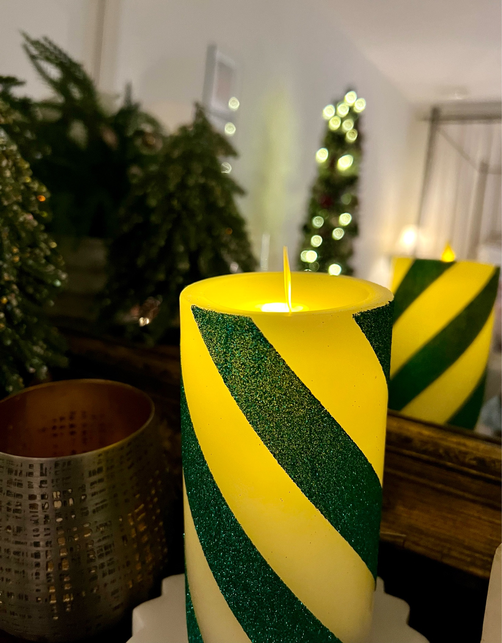 Luminara candy cane flameless moving flame led candle! Real wax with green glitter stripe, timer, unscented.

#LTKGiftGuide #LTKHome #LTKHoliday