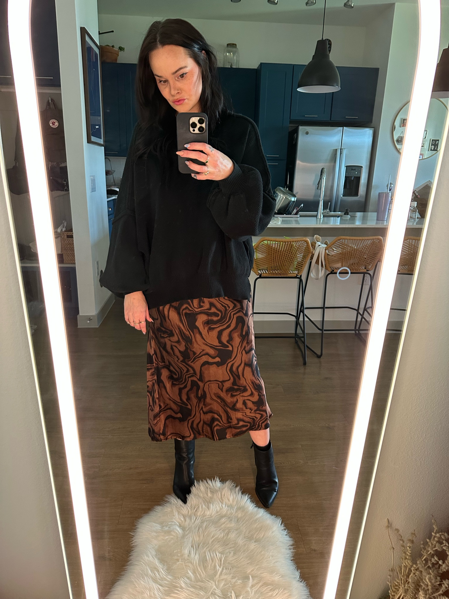 This y2k style satin midi skirt is quickly becoming a fall staple for me

#LTKstyletip #LTKsalealert #LTKunder50