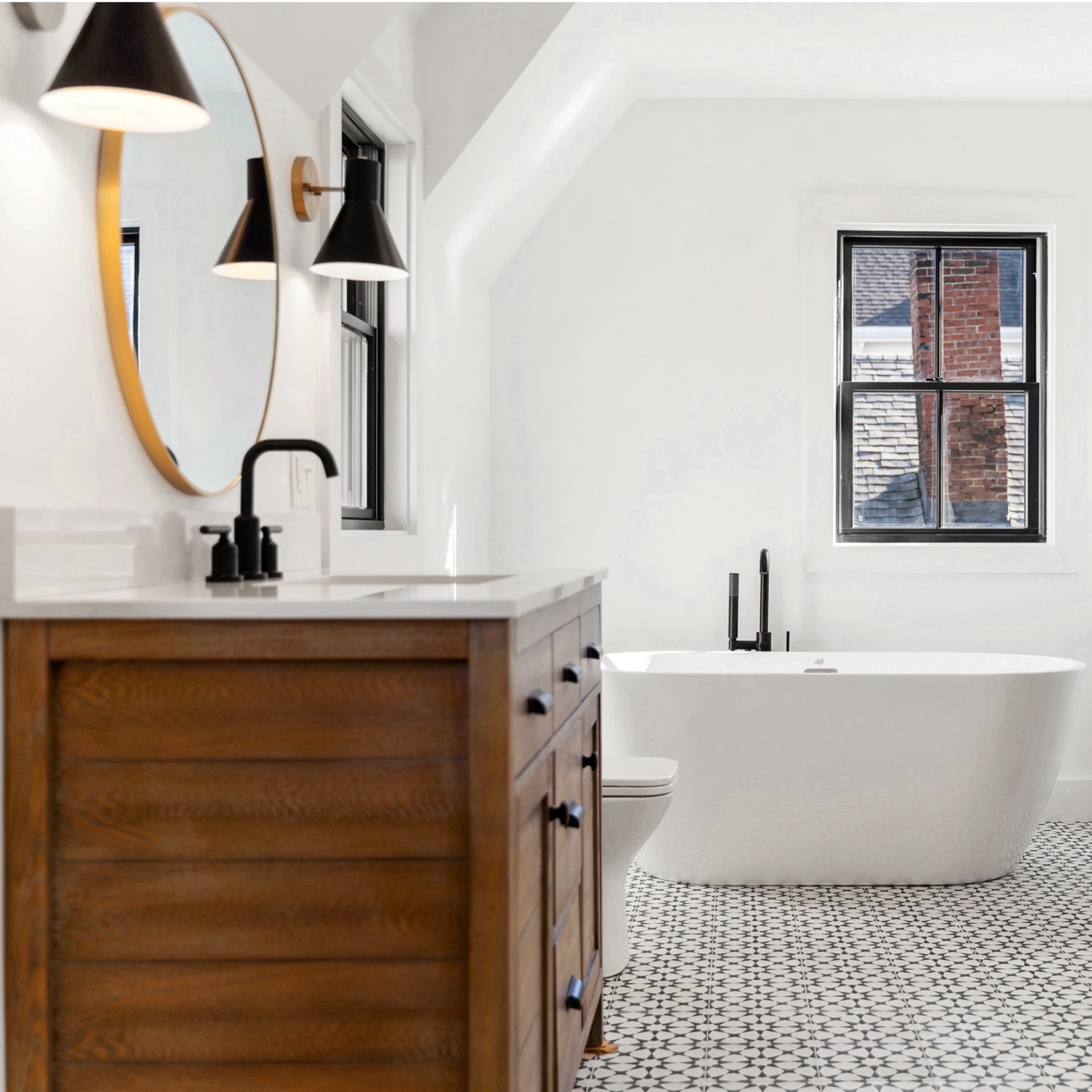 our goal with the full bathroom at the #witchymodern house was to create a spa-like oasis. a massive walk-in shower anchored one end of the bathroom, while this beautiful freestanding tub was located at the other end. the tub provides the perfect spot for soaking while admiring the beautiful cement tile! #dwelloctober

#LTKhome