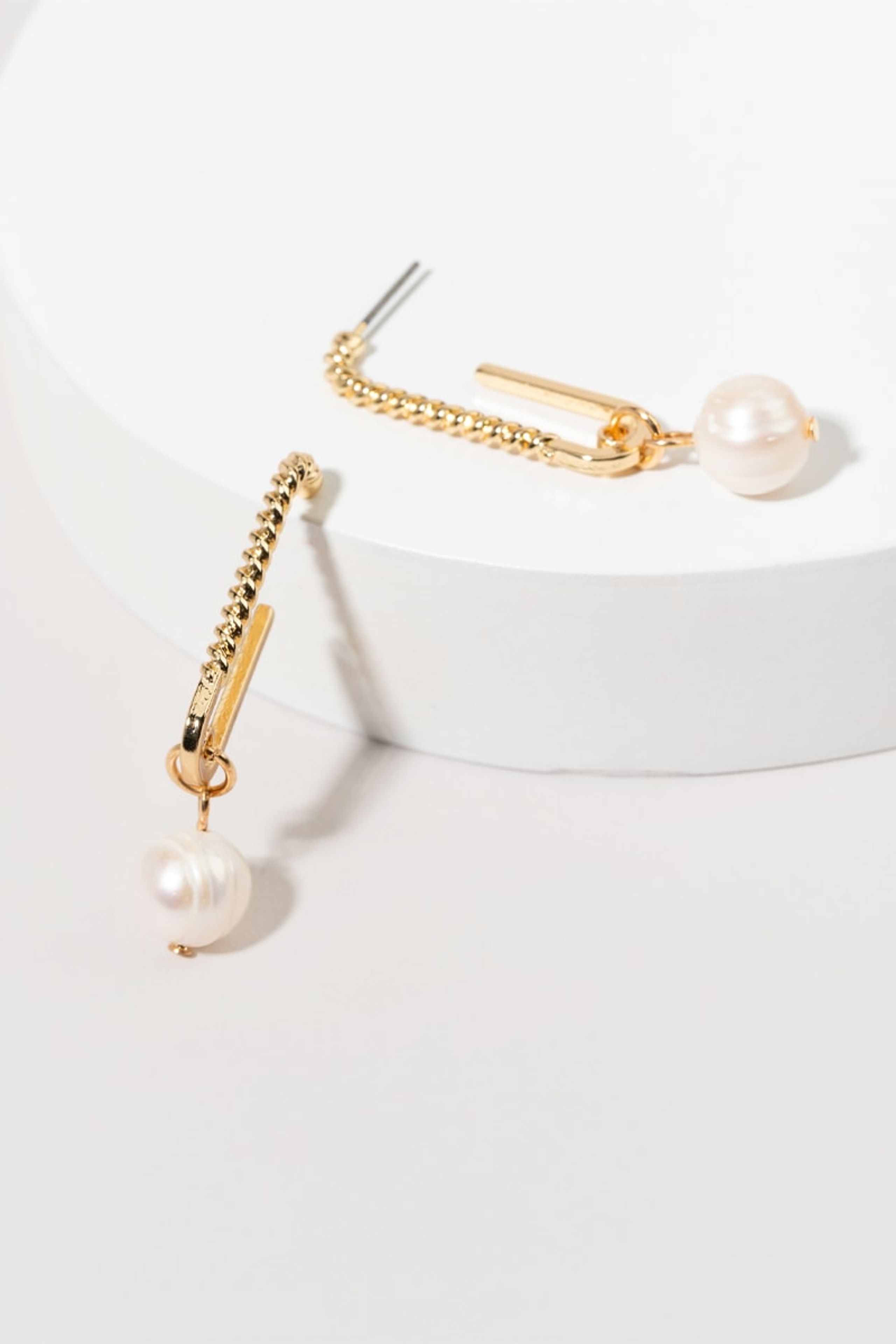 Darya Pearl Charm Twist Drop Earrings | Francesca's