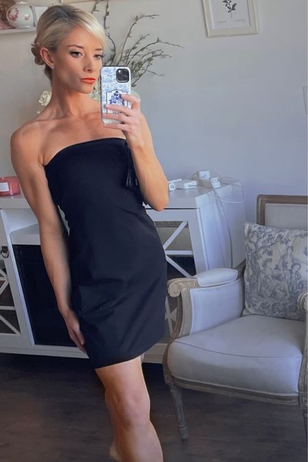 Susana Monaco Strapless Dress in Black 🖤

I have been living in this dress all summer!

〰️ About The Dress 〰️
• Fabric: The fabric is lightweight, making it the perfect year-round piece for Florida living. The jersey material travels well and has been my most effortless piece to pack and go. I brought it with me on my two trips to New York this summer.

• Fit & Design: The pullover design is much simpler than dealing with buttons and zippers that can break. It is partially lined and doesn’t hold you like a corset dress.  This dress does not have tummy control or corseting. Try a size up from your regular size if you want a looser fit. Try a size down for a tighter, more Kim K look. 
• Straight Silhouette: The sleek, simple shape makes this strapless tube dress my favorite throw-on-and-go piece for summer weather. 

〰️ How To Style 〰️
Style it with a pair of black patent leather pumps and a matching black patent leather clutch. This will instantly make you to Audrey Hepburn lookalike! 

For a more casual outing, I suggest a pair of heeled sandals in a nude or blush color. I wore nude point-toe Dream Paris Pumps for cocktails last Saturday. 

〰️ My Review 〰️

For a casual daytime event or an evening out at night, this tube dress’ smooth feeling is the epitome of comfortable chic.

This strapless Susana Monaco dress is an effortless and flawless throw-on-and-go piece for summer weather with a sleek, simple shape. Grab your favorite heeled sandals for a dressier occasion, or pair the dress with a flat sandal for a more casual outing.

#LTKSeasonal #LTKtravel #LTKunder100