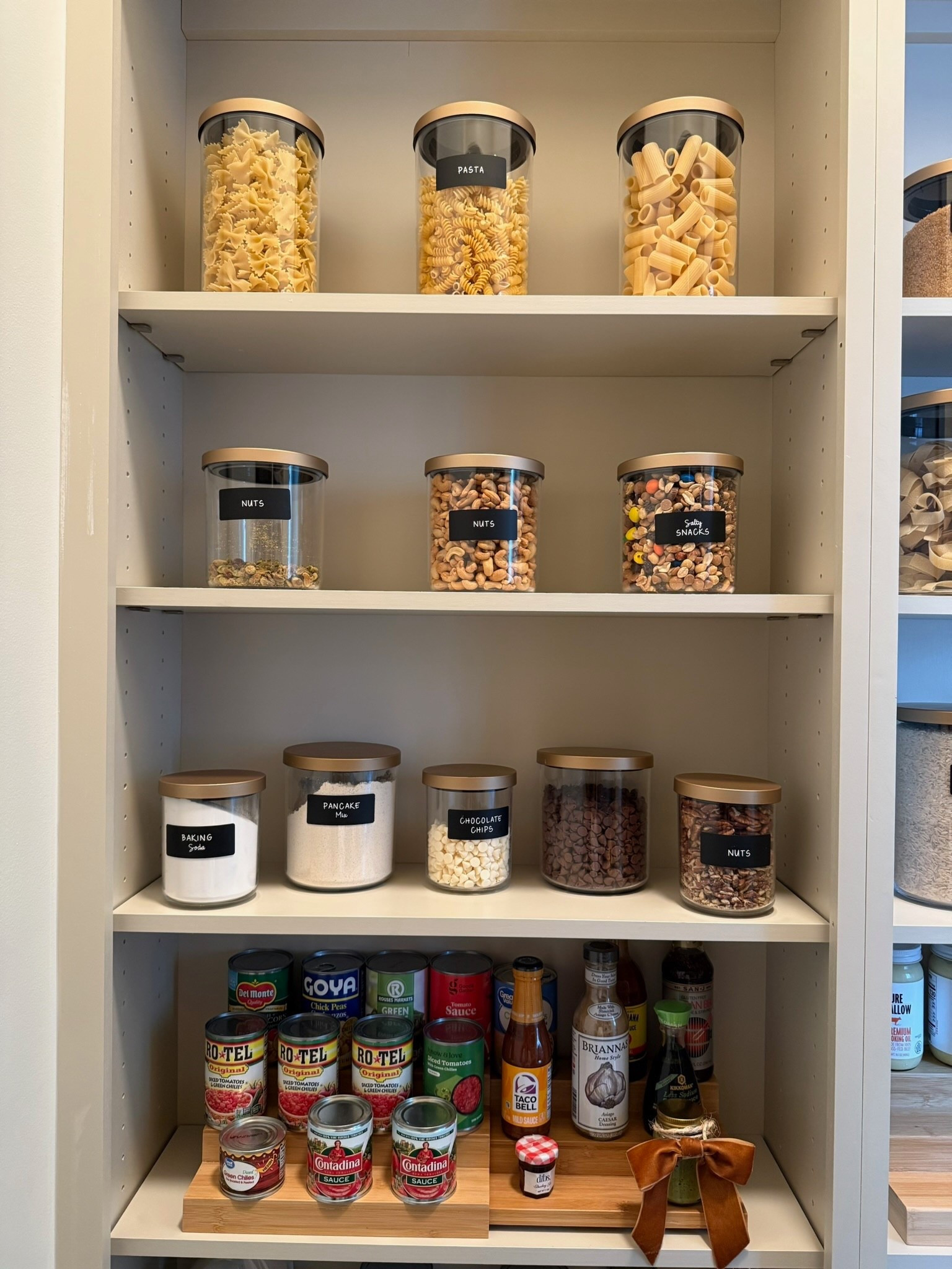 Love these glass canisters for my pantry!
Linking to similar ones on Amazon!

#organization #homeorganization #pantryorganization #glasscontainers #canisters #spicerack