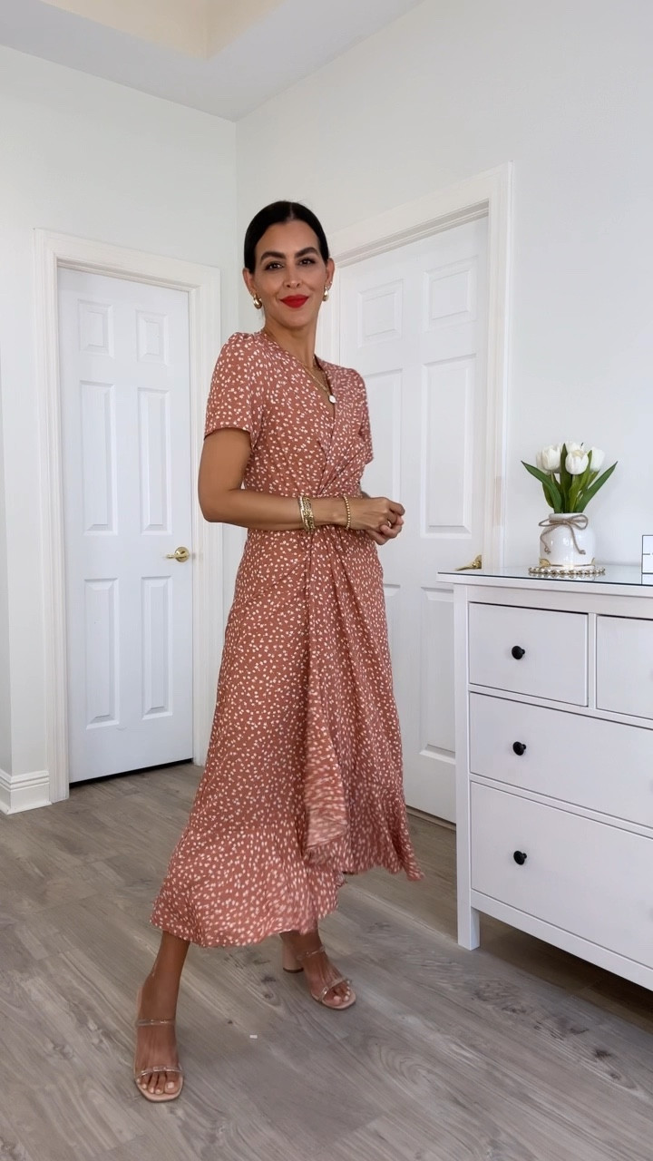 Amazon wrap dress! Great for summer or with booties for fall! Wearing color Red White Floral in size s. 
Shorts are on sale! Wearing a size 27
Lipstick is feels so grand. 

#LTKVideo #LTKSeasonal #LTKU