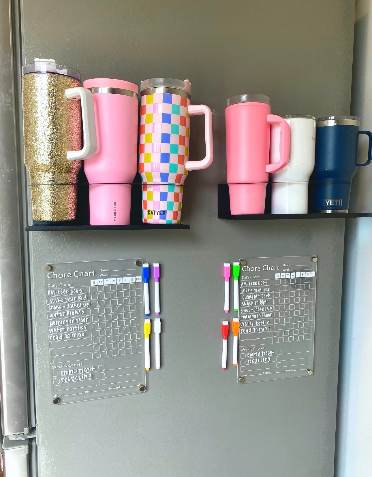 Trying to maximize our storage in the kitchen and SO OBSESSED with how these magnetic solutions! Found these acrylic chore charts do the kiddos and love that it came as a 2 pack + magnetic markers. These magnetic cup holders are a game changer! They were taking up SO much space in our drawers. Love being able to use this empty space for storage! Adding my exact + a few other options  


- chore charts
- kitchen storage 
- Stanley cups 
- kitchen organization 
- organized home 
- magnetic storage 
- home finds 
- declutter with me 


#LTKHome #LTKmomlife #LTKSaleAlert