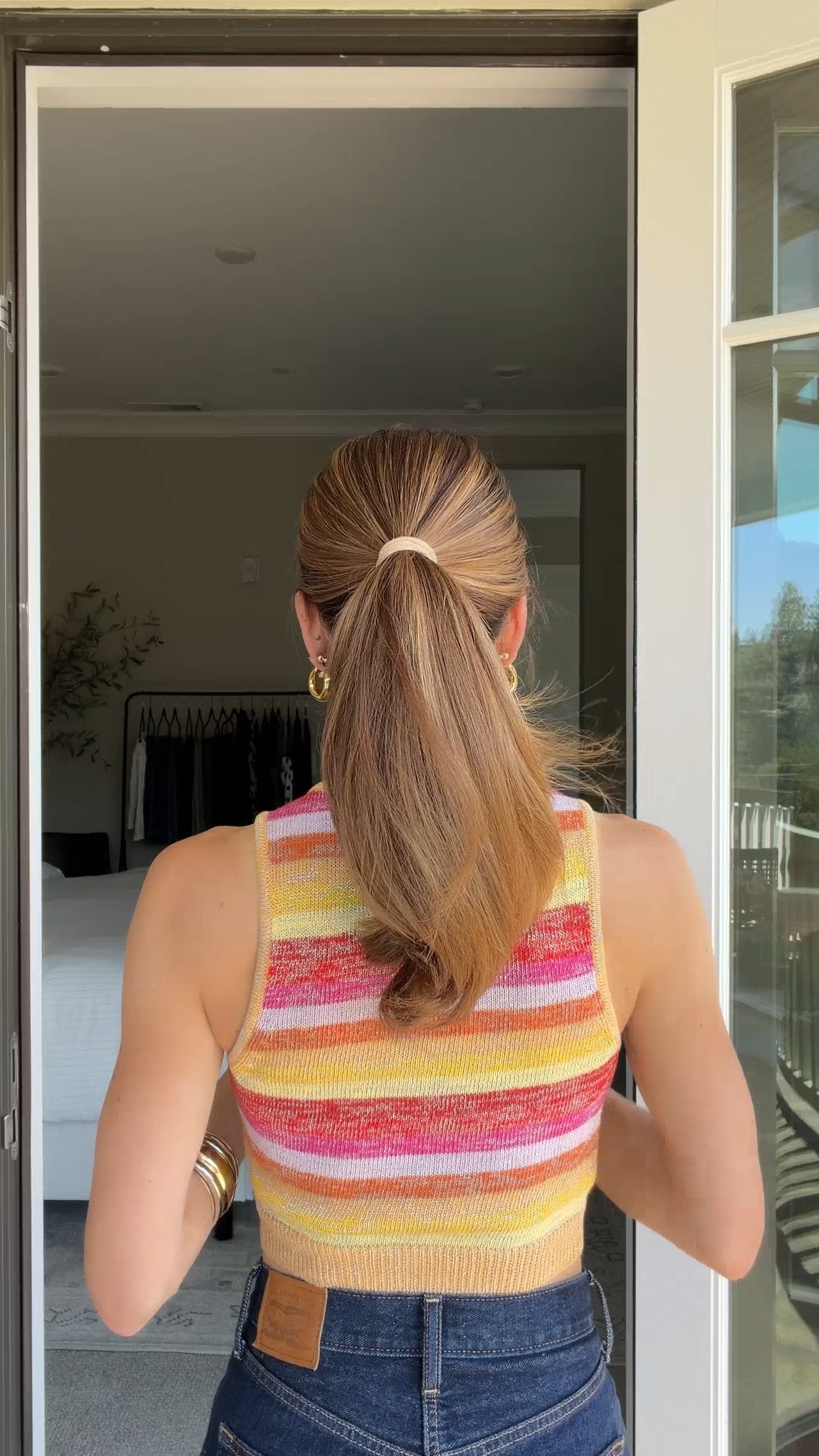 Easy hidden volume hack! 💁‍♀️

Gather your hair into a ponytail and secure it with a hair tie. Lift your ponytail and place a small claw clip underneath, then drop your hair over it to hide the clip and add volume. Wrap a clear elastic around the ponytail and claw clip to form a bun. Split the remaining tail into two sections and bring them up above the bun. Cross the sections over each other, then place another clear elastic over the entire bun to secure! 

 #LTKootd #LTKSeasonal #LTKBeauty