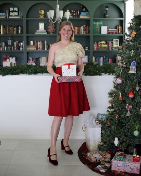 Red bow skirt and green bodysuit one shoulder. Christmas holiday outfit idea  

#LTKHoliday #LTKSeasonal