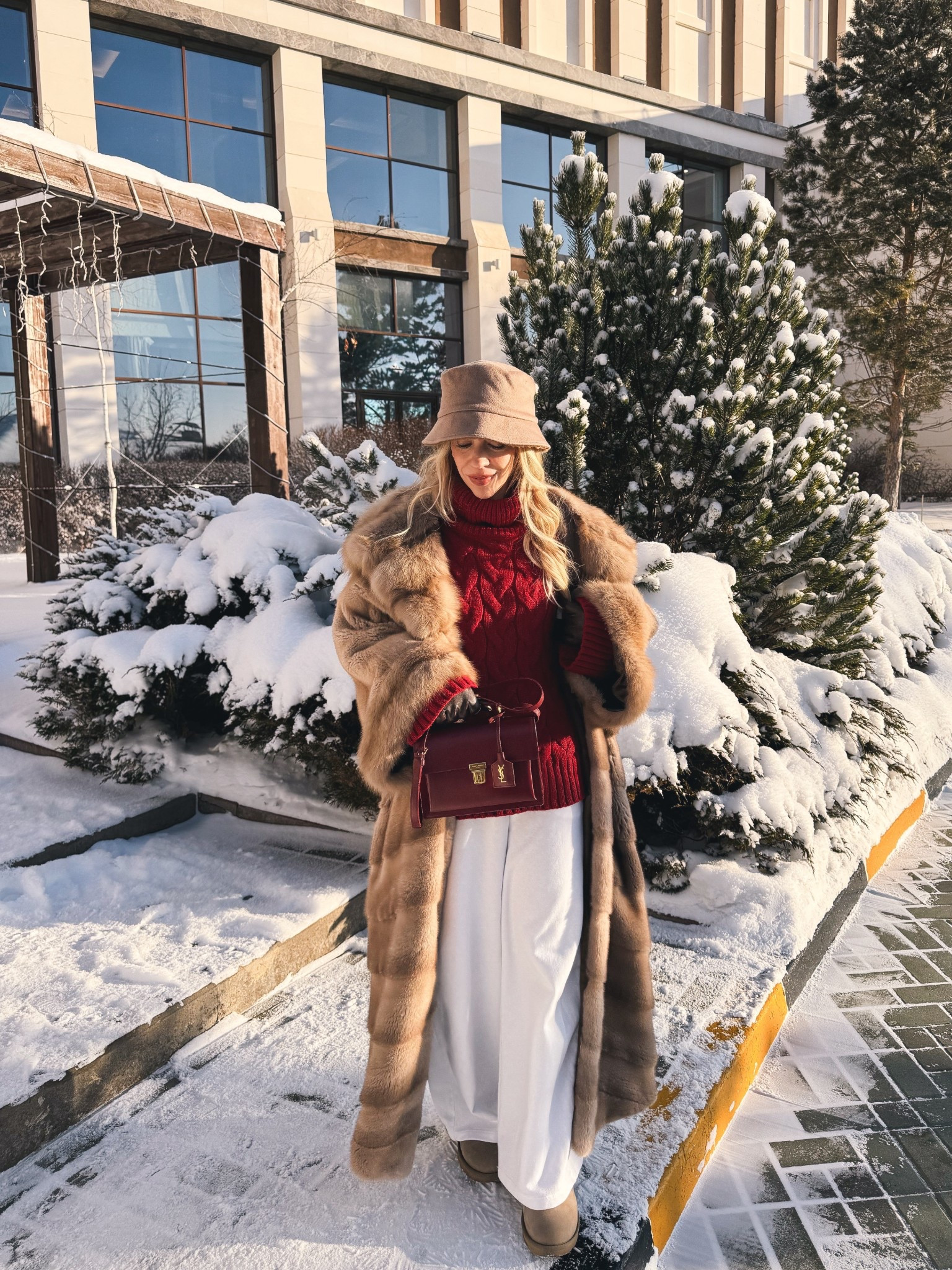 Camel fur coat, red cable knit sweater, winter white and red outfit, cream wide leg joggers, Ugg mini boots, snow day outfit 

#LTKOver40 #LTKSaleAlert #LTKFindsUnder100