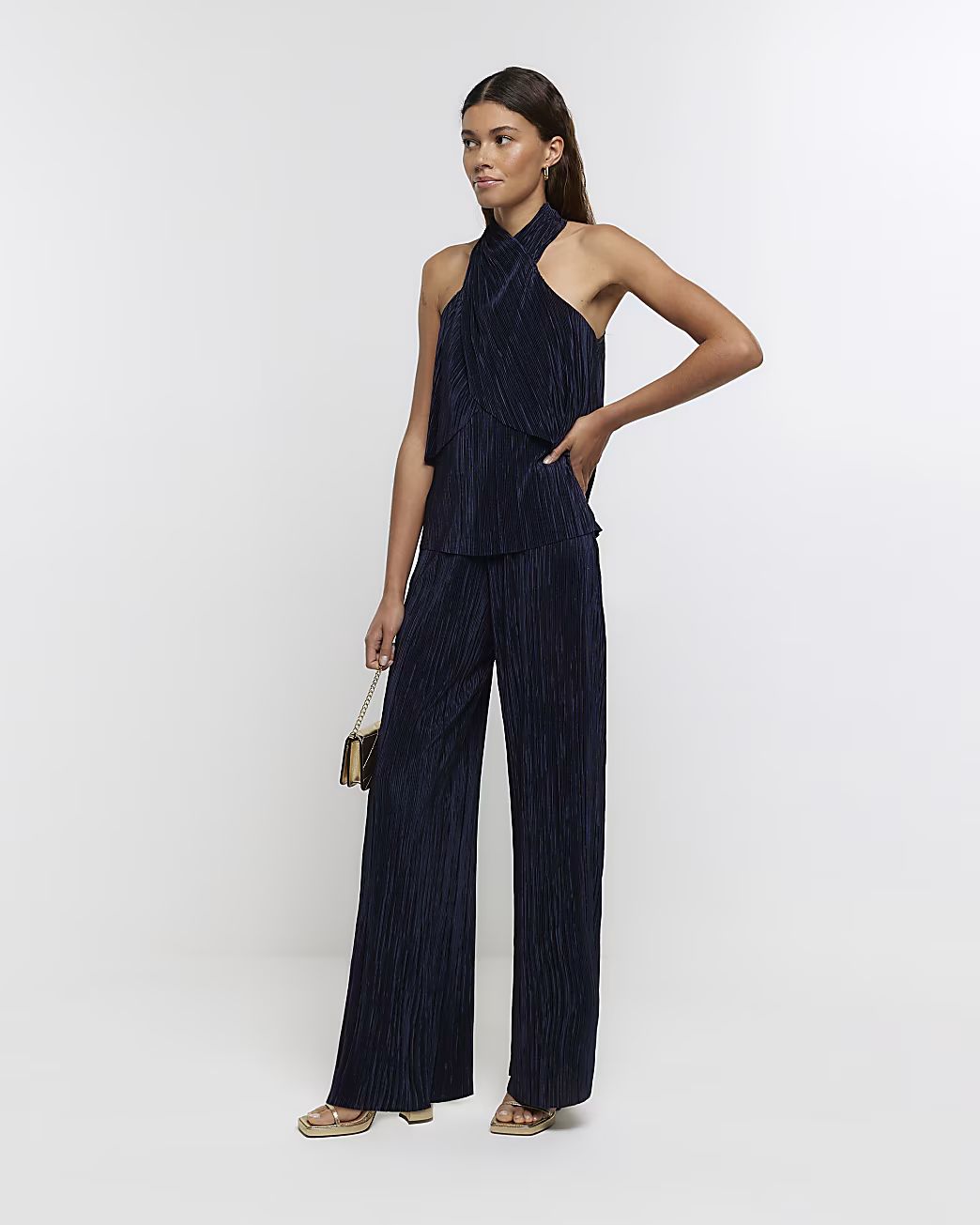 Navy plisse flare trousers | River Island (UK & IE)