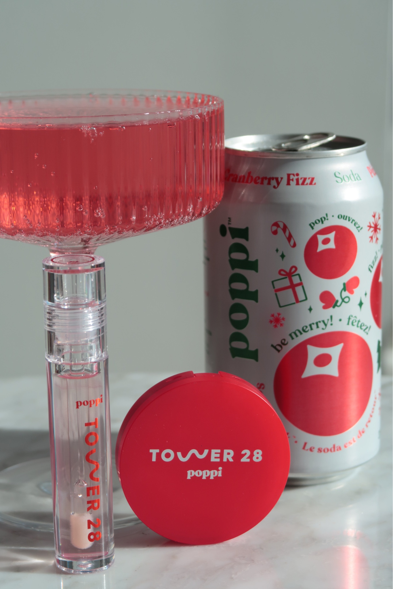 The Tower 28 × Poppi collab feels like a little sip of brightness for your beauty routine — lightweight, glossy, and instantly refreshing. The clear, soda-inspired packaging has that crisp, dewy look that catches the light in the prettiest way, and the formula inside stays true to Tower 28’s clean, skin-friendly approach. It gives the lips a sheer, juicy tint with a smooth, hydrating finish that feels more like skincare than makeup.

Cranberry Fizz adds a soft pop of colour — bright enough to lift your face, subtle enough for everyday wear. The texture is silky and cushiony, with a gloss that melts in instead of sitting on top, making your lips look naturally full and healthy. It’s the kind of product that feels easy: no mirror needed, no overthinking, just a glossy, fresh lip moment that works with anything.

A sweet, simple collab that brings together Poppi’s playful fizz and Tower 28’s minimal glow — creating a gloss that feels happy, wearable, and effortlessly pretty.

Hashtags
#Tower28Beauty #PoppiCollab #FizzFrost #CranberryFizz #CleanBeauty #GlowyLipLook #MinimalMakeup #JuicyGloss #BeautyTok #SoftGlow #AestheticBeauty #EverydayMakeup

#LTKHoliday