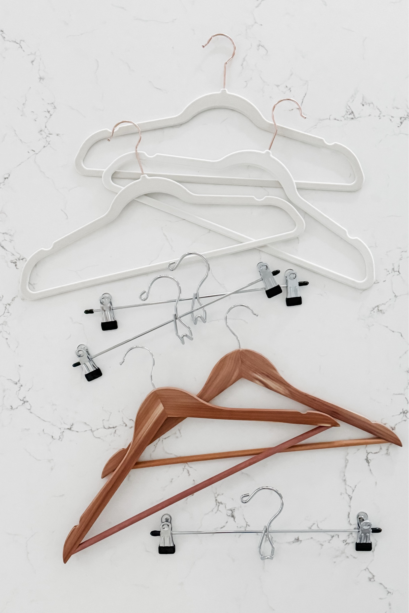 Having the right hangers can make all the difference in caring for and organizing your wardrobe! 

—> I use the felted hangers for most of my hanging items because many of my tops are a fabric that easily slithers off of a smooth, plastic hanger. I also love their slim profile so they take up less space!

—> Pant hangers are self-explanatory — avoid the crease that comes from folding them over the lower bar on a shirt hanger. We also love to use these for air-dry items. *You can also buy felt clips to attach to your existing felted shirt hangers to convert them into pant hangers.

—> Cedar, heavy-duty hangers are excellent for wool items as well as for heavier items like thick knit sweaters and winter coats.

#LTKHome