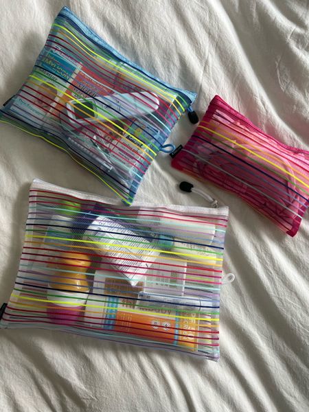 Rainbow mesh pouches i used when packing Demi’s suitcase 