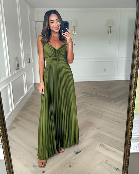 Nena Evans X Petal & Pup is live! Wearing the palm green Naira pleated maxi dress in size 2. Choose your size based on your bust since the bottom is flowy. If you have a larger bust, size up.



Wedding guest dress
Black maxi dress
Black tie dress
Black tie optional 
Formal dress
Fall wedding guest dress 


#LTKwedding #LTKstyletip