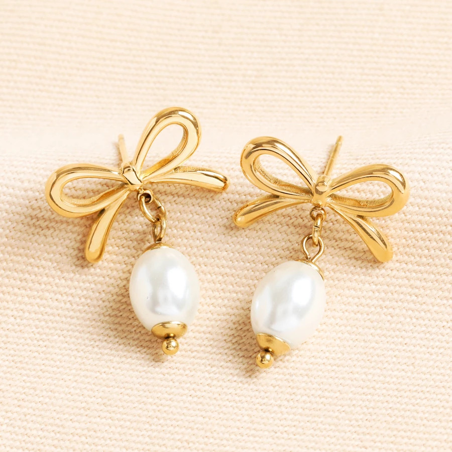 Stainless Steel Bow Pearl Drop Earrings in Gold | Lisa Angel