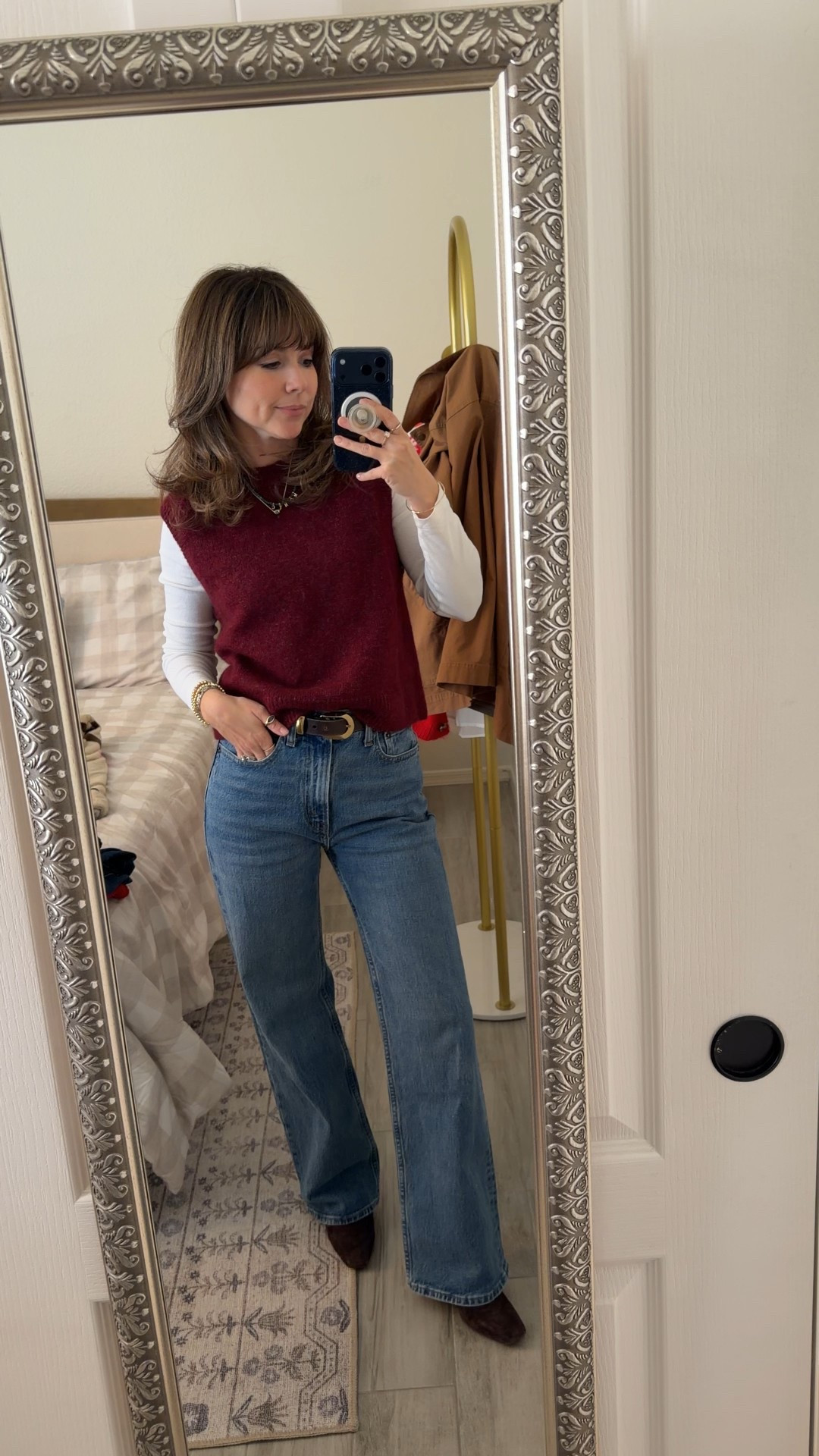 Petite winter outfit idea (5’2 approved): sweater vest + long sleeve + straight jeans + ankle boots.
Classic, warm, and so easy to recreate

I’ve worn this sweater so many different ways with jeans and skirts and slacks such a great staple

Comment SHOP below to receive a DM with the link to this post on my LTK ⬇ https://liketk.it/5F9QR #ltkpetite #ltkootd

#LTKPetite