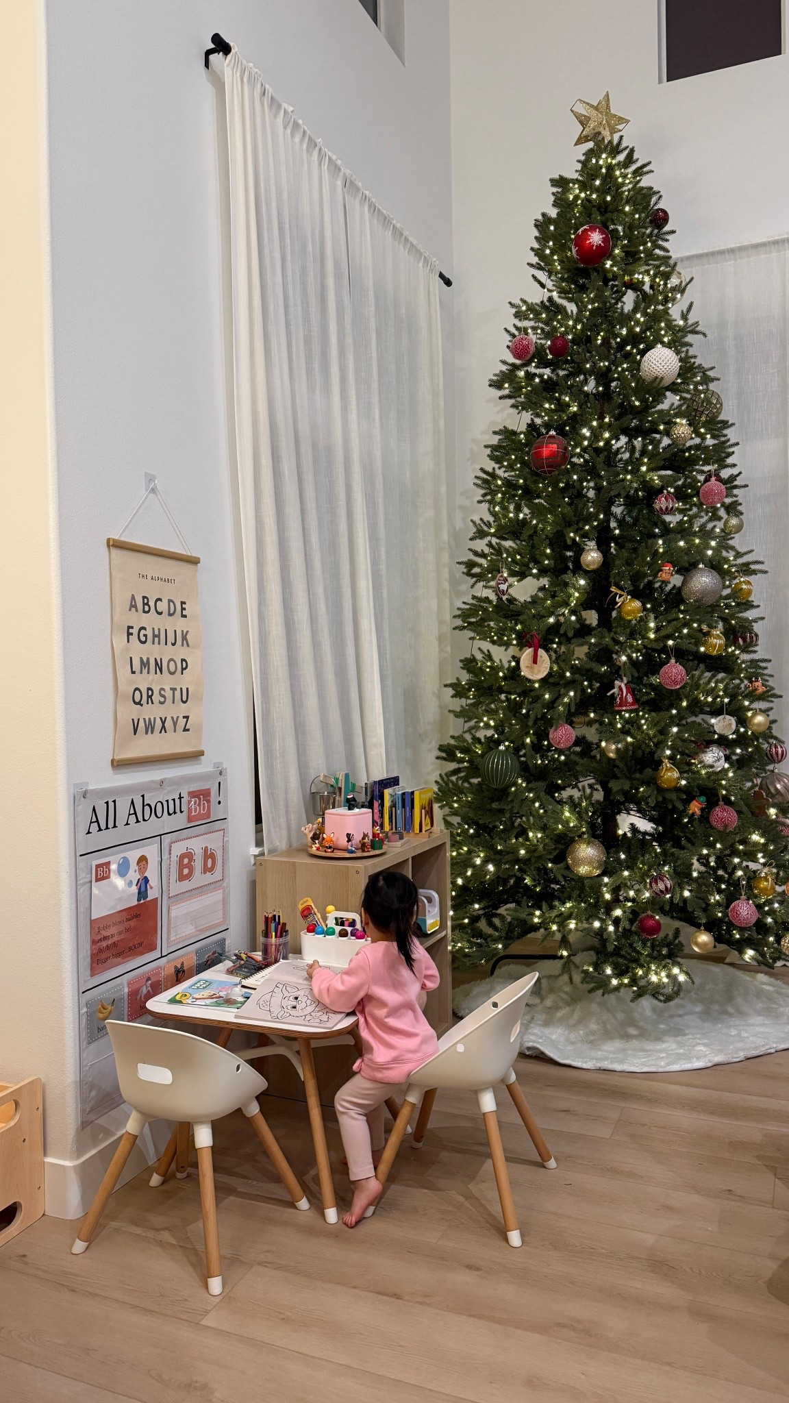 christmas tree is up! we still have our play learning corner :’) #toddlermom #christmastree #momlife #playroom 

#LTKmomlife #LTKHoliday #LTKKids