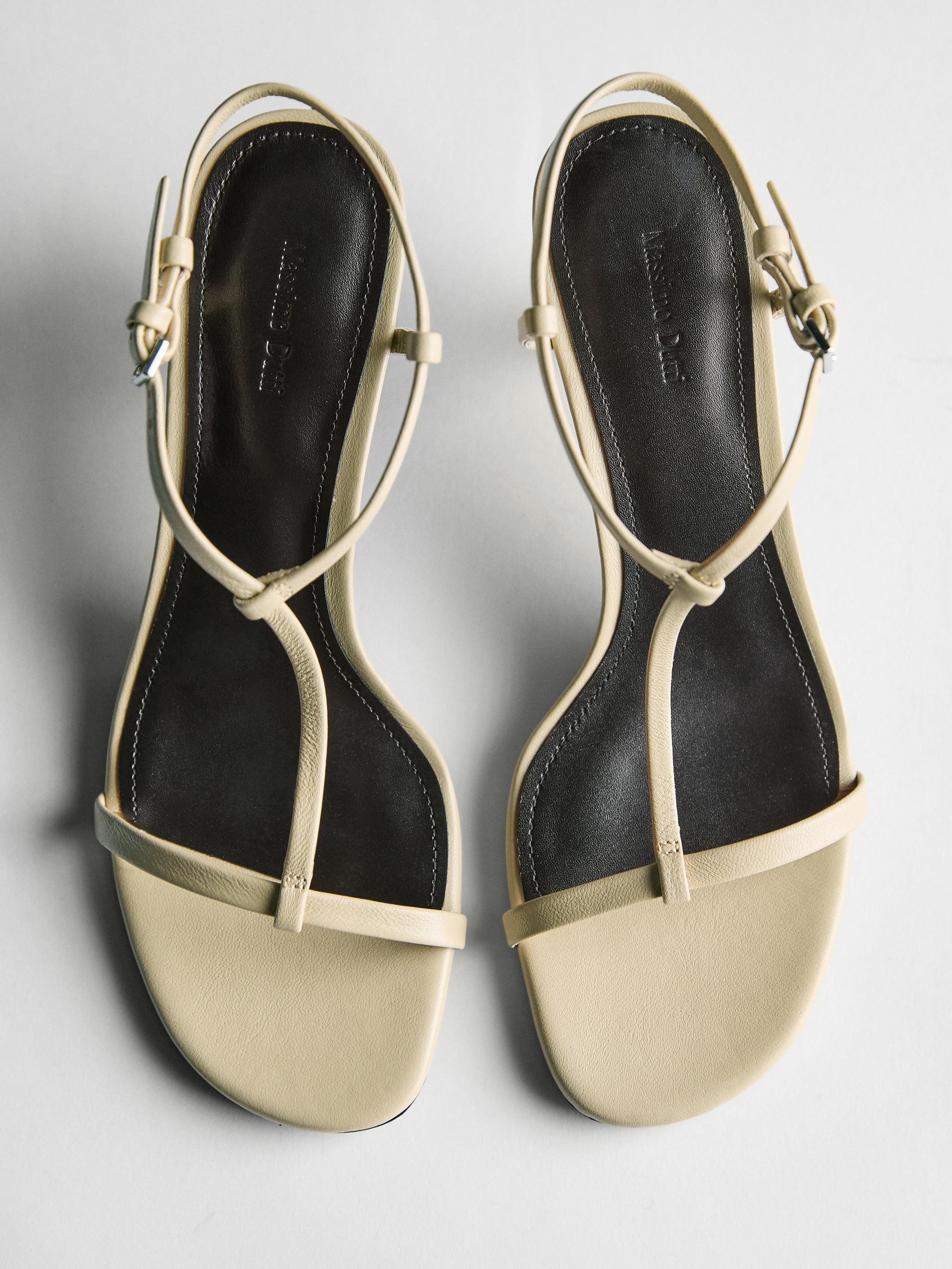 VIEW LOOK
Strappy mid-heel sandals

 $180  Colour  Cream  Add to basket Colour Cream|Ref. 1611/75... | Massimo Dutti US