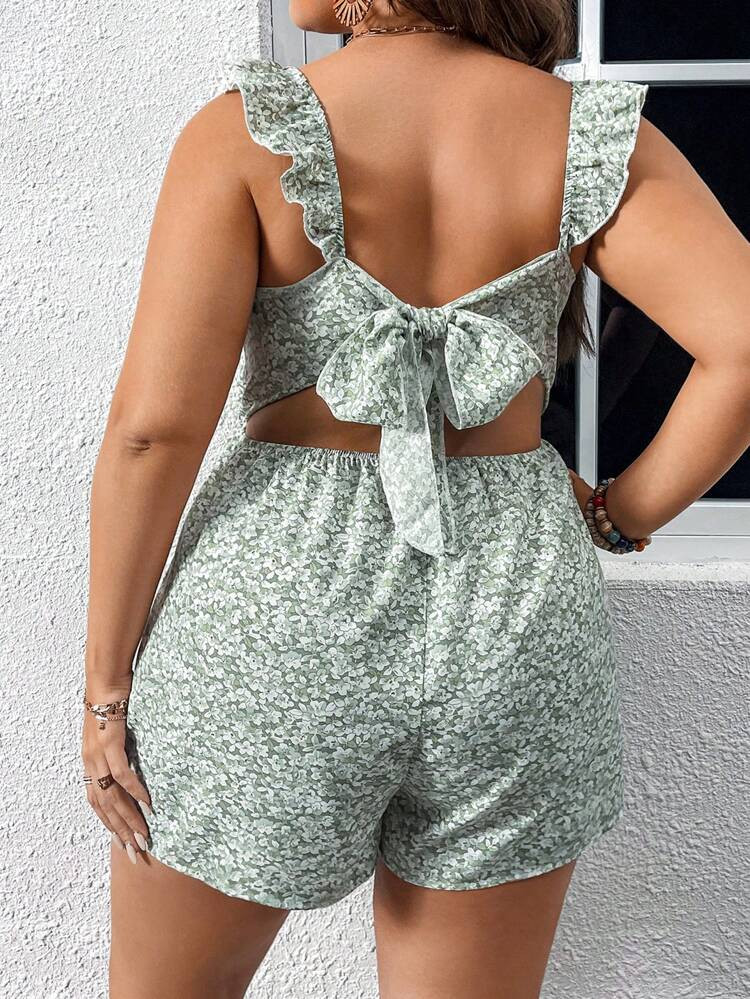 SHEIN X Madison Plus Ditsy Floral Print Ruffle Trim Romper
       
              
              $... | SHEIN