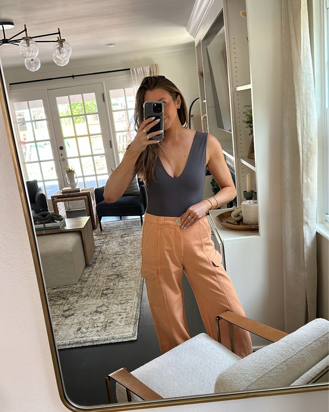 Highwaisted wide leg cargo pants & deep v neck bodysuit. Both fit TTS & come in multiple colors 

#LTKSeasonal #LTKunder100