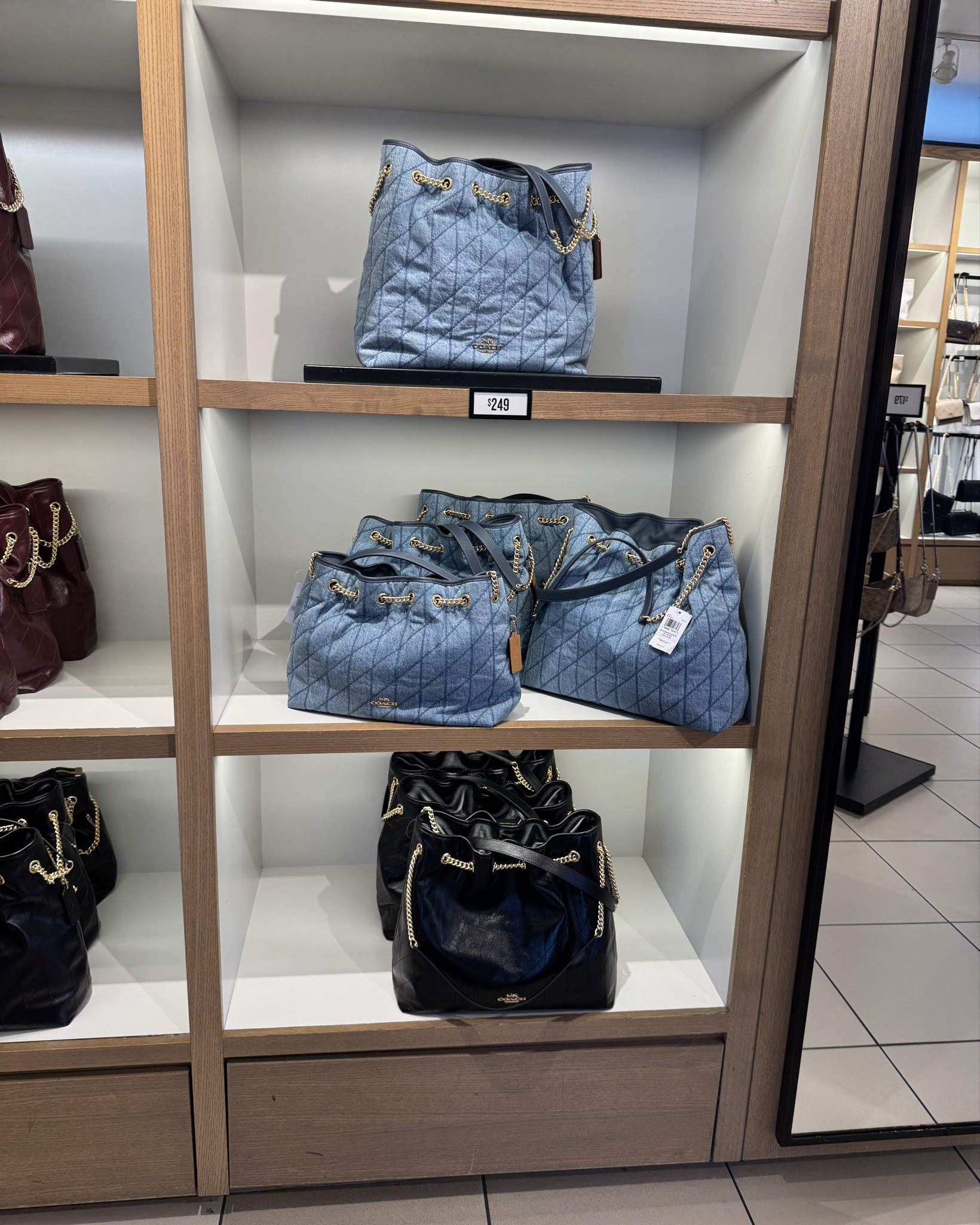 Denim Coach Evelyn or Black? Both are teaaaa ! #coachbag #coachoutlet 