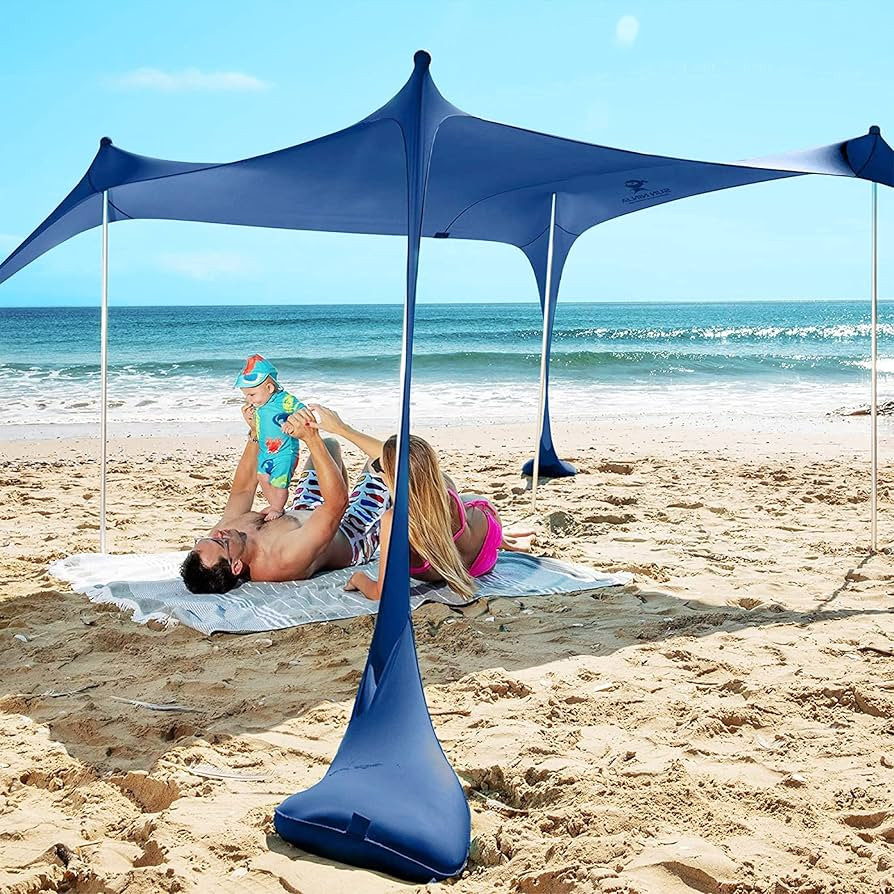 SUN NINJA Beach Tent Sun Shelter with UPF50+ Protection, includes Sand Shovel, Ground Pegs and St... | Amazon (US)