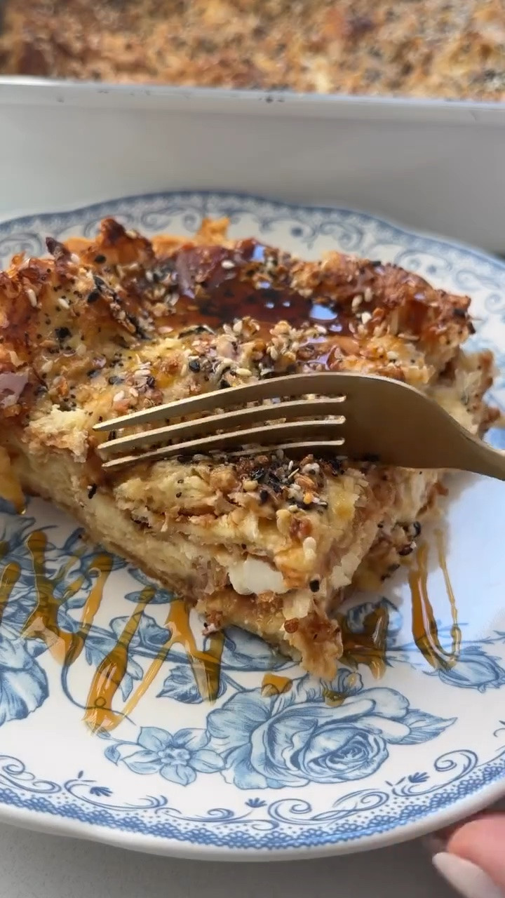 everything bagel croissant bake 

bacon, cream cheese, greek yogurt custard, hot honey at the end. whisk it, pour it, 35 minutes. make it the night before and bake it in the morning.
 
Full recipe on wholesomelymorgan.com✨

#LTKfoodie #LTKmomlife #LTKHome