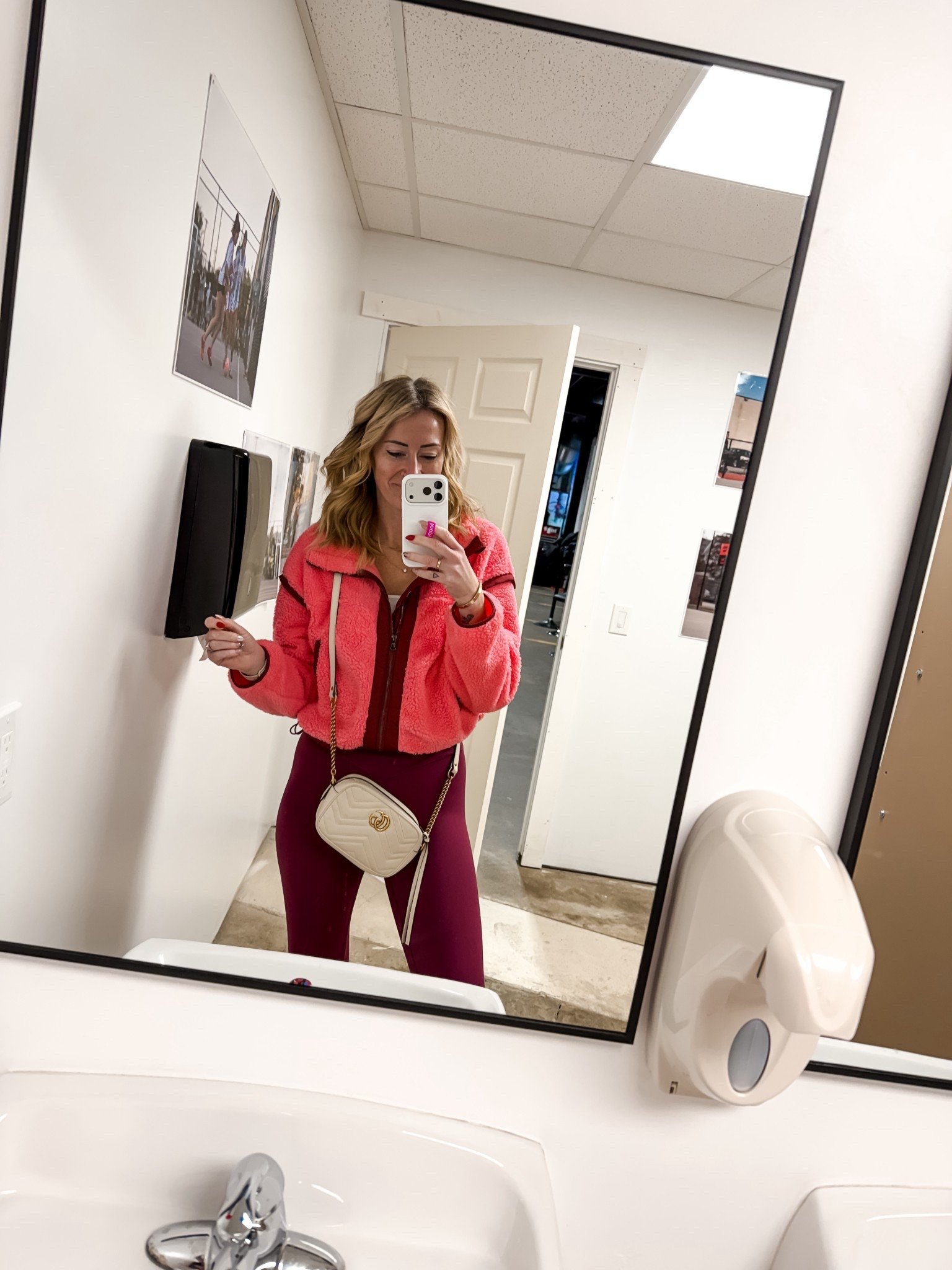 Soccer ma’am, outfit idea, ideas, winter and cold weather sports mom outfit idea, ideas, pink Sherpa is a free people look for less style with flared leggings, small white Gucci bag