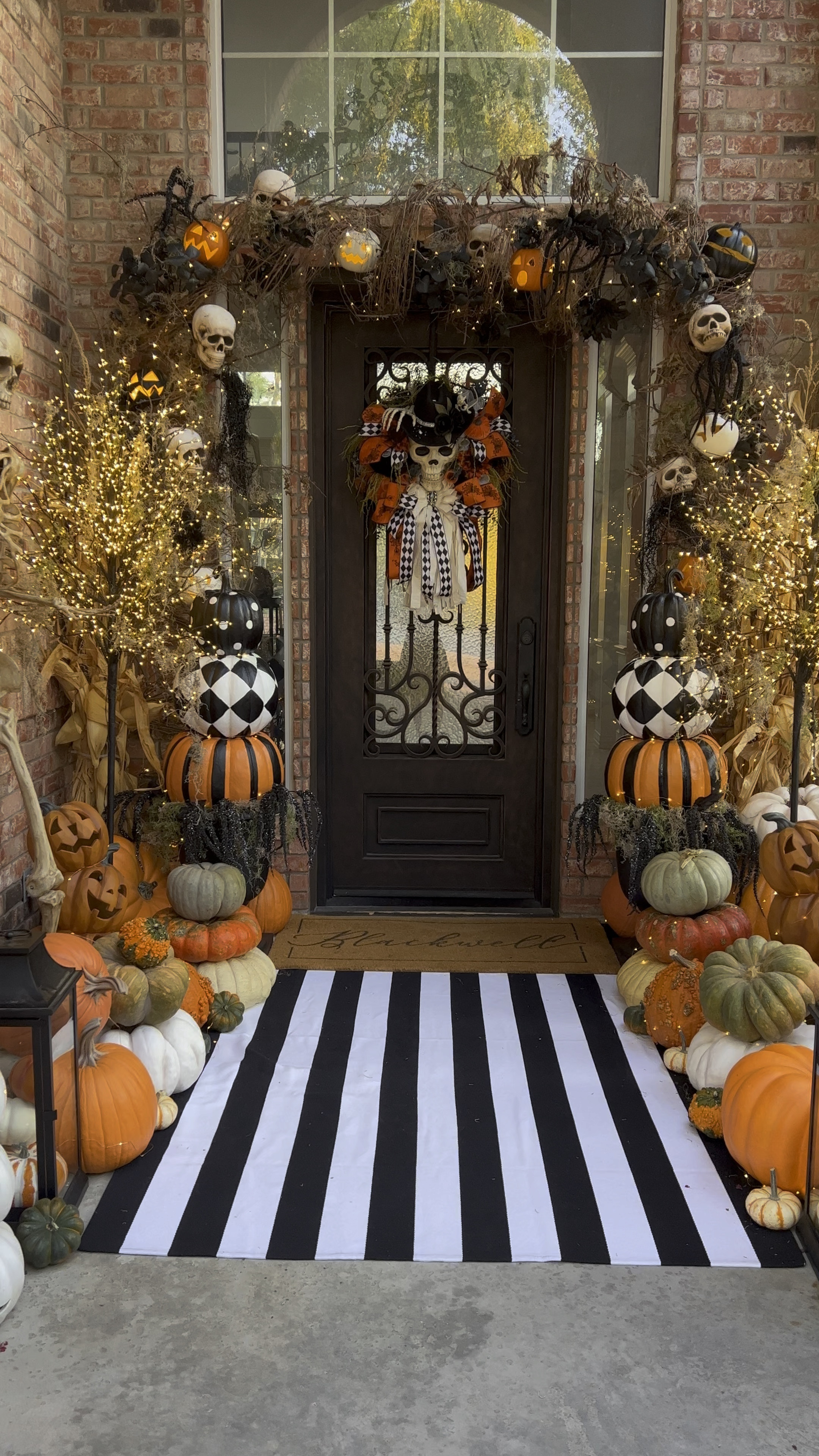 
Halloween Porch!💀 Step-by-Step!🦇 
1. We started with a grapevine garland, and ran twinkle lights in in! 
2. Then I started jamming in sticks from the brush pile in our backyard 😅 
3. Added spooky black picks, mini jack-o-lanterns, and foam skulls. 
4. We finished it off my stringing on Spanish moss to give it that eerie look. 
5. Filling in the porch with pumpkin topiaries, spooky tree, and a mix of real and faux pumpkins! 

Decor & skeleton outfit linked in my LTK! 


#halloweenporch #halloweendecor #spookyseason #decoratewithme


#LTKSeasonal #LTKhome #LTKHalloween