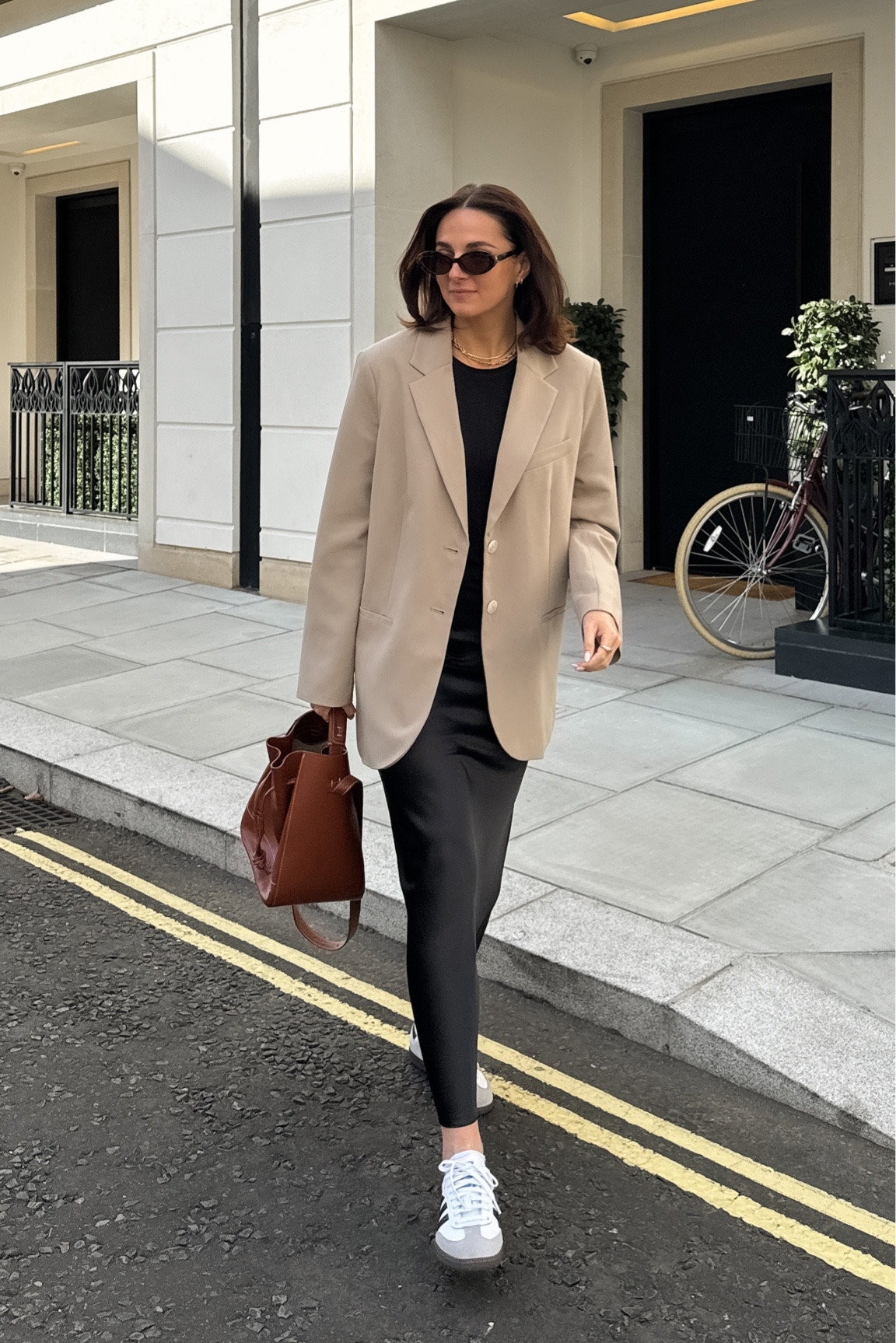 Smart casual autumn outfit, satin skirt, brown blazer, adidas sambas 

#LTKstyletip #LTKshoecrush #LTKeurope