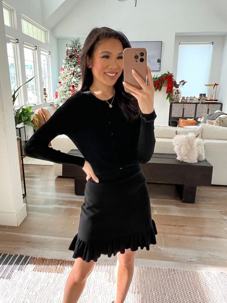Winter outfit with black sweater dress that I absolutely love! Wearing size XS and it fits TTS. Love the ruffle on the end. Super pretty with pumps or flats. Can be dressed warmer with tights, boots and and a coat 

#LTKstyletip #LTKSeasonal