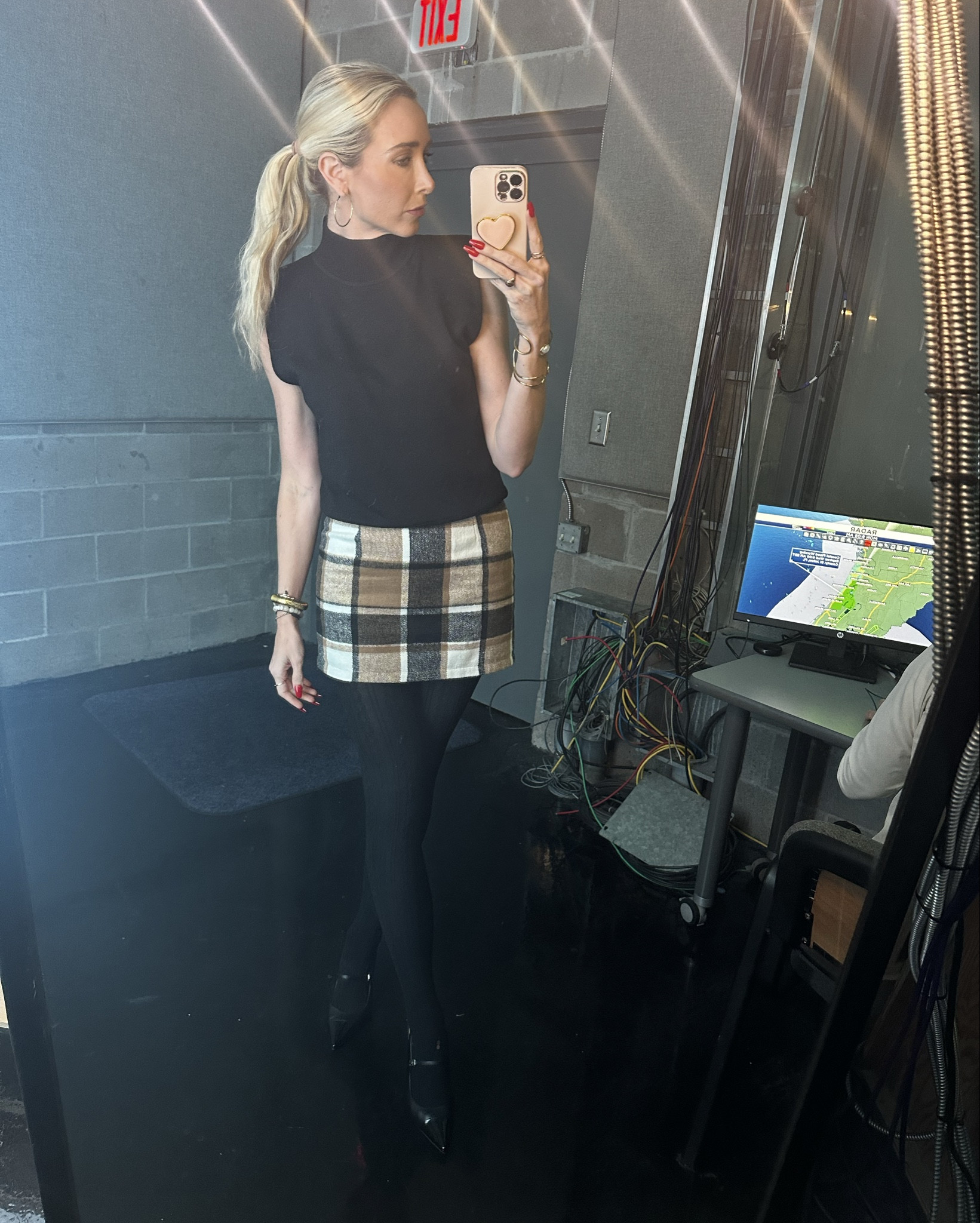 Tall girl fall 🤎
Sleeveless sweater with mock neck and just a little padding in the shoulders + opaque black tights + sling back black shoes + taupe and black plaid skirt 

** I linked two pairs of shoes, the Nine West ones I am wearing are great, but the Steve Madden are more comfortable