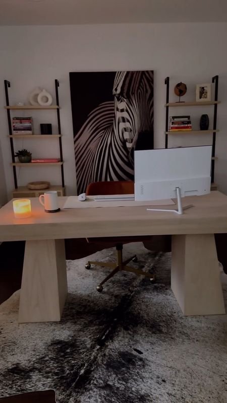 Home office of my dreams 🫶 I love this space so much and I’m obsessed with this desk from CB2 
.
.
.
.
.
.
Home office, modern home decor, interior decorating, modern home style, amazon home, target home, cb2 home, office desk, office rug, shelving, cowhide rug, glass cabinet, office inspo, work from home, living room decor, bedroom decor, midcentury modern decor, modern desk, wooden desk, crate and barrel desk, cozy home decor #homeoffice #officedesk #officedesign 

#LTKhome #LTKstyletip #LTKVideo