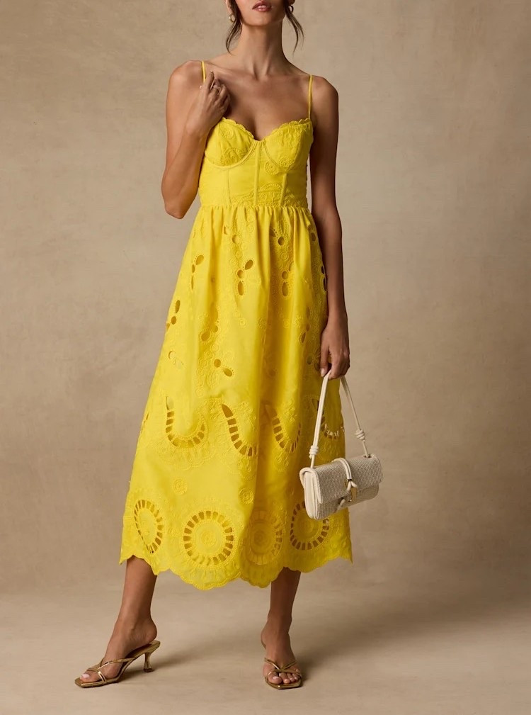Inspired by sunlit gardens, the Jenora Yellow Embroidered Bustier Midi Dress combines delicate embroidery, a structured bustier bodice, and a graceful midi silhouette for a look that’s effortlessly feminine. Its cheerful yellow hue brings warmth and elegance to every special occasion. Under $100.

Keywords:

* yellow embroidered midi dress
* bustier midi dress
* yellow occasion dress
* embroidered summer dress
* wedding guest dress
* garden party dress
* spring midi dress
* brunch outfit
* bridal shower dress
* feminine fashion
* romantic midi dress
* elegant daytime dress
* vacation dress
* floral embroidered dress
* countryside fashion
* luxury summer dress
* special occasion dress
* timeless midi dress
* European summer outfit

#LTKgrwm #LTKTravel #LTKWedding