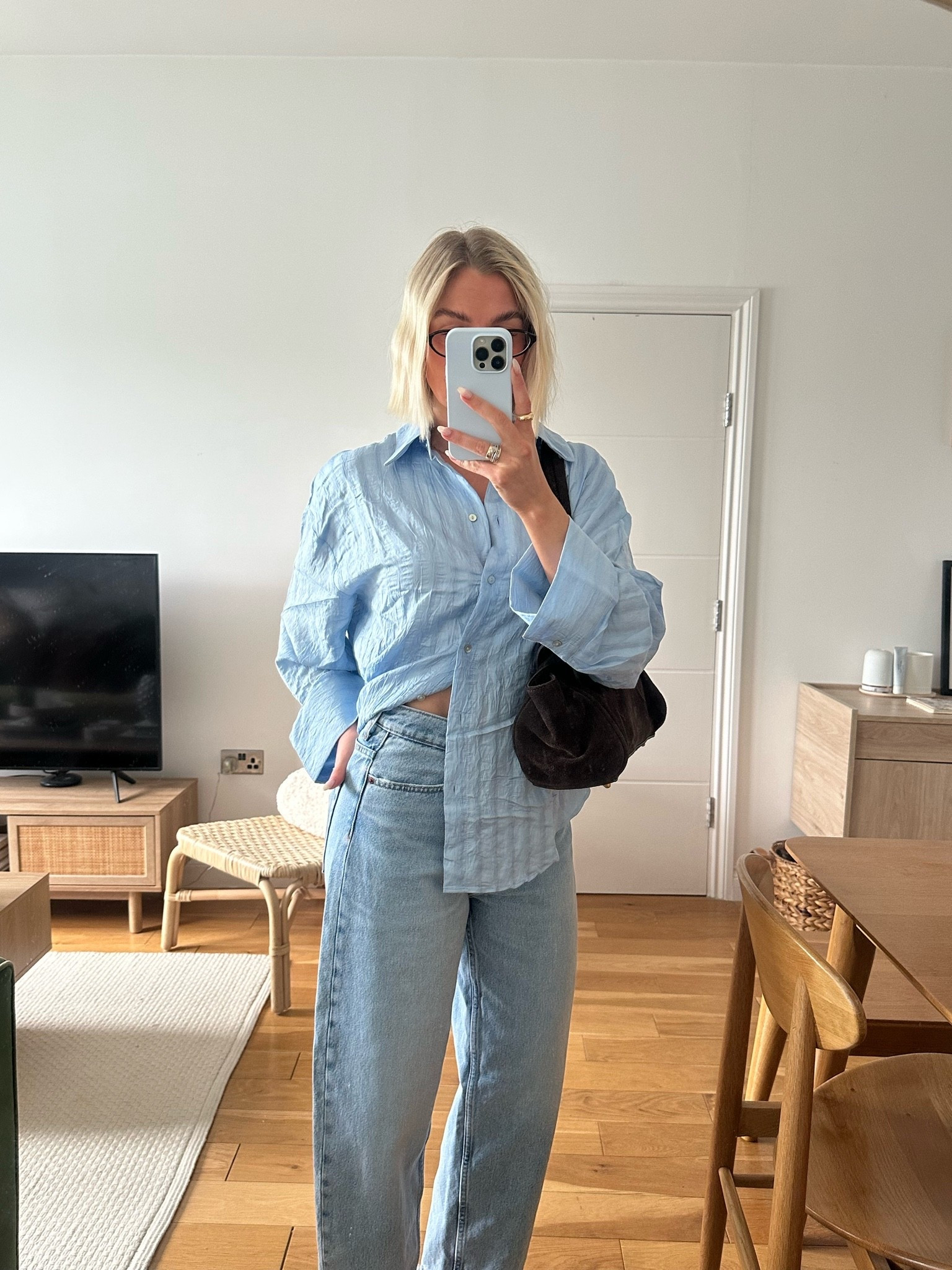 Levi’s wash jeans 
Light denim barrel Jeans
Barrel jeans 
Blue shirt 
Spring outfit
Brown suede bag  
Casual workwear outfit

#LTKootd #LTKgrwm #LTKWorkwear