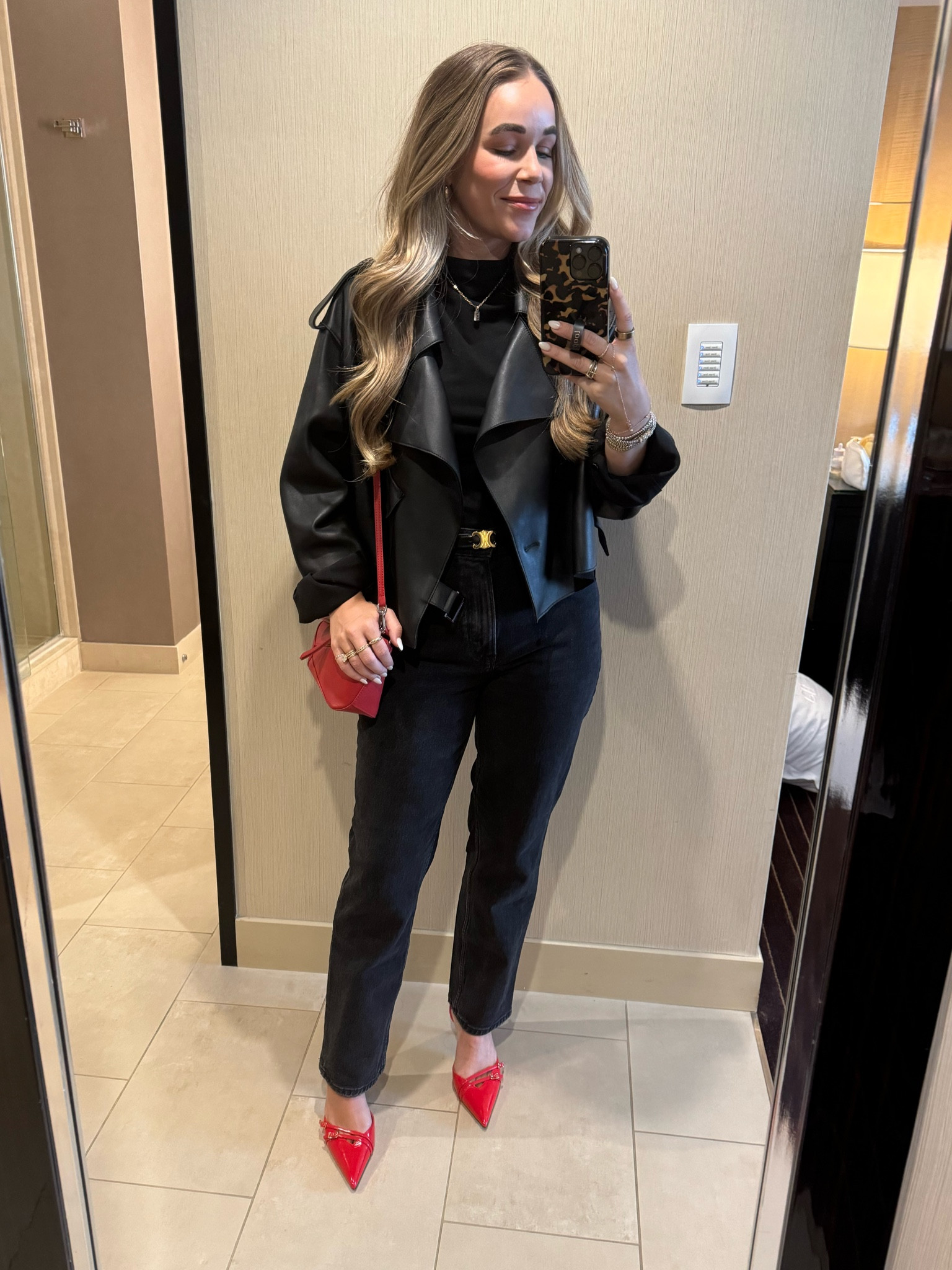 Red heels. Black outfit. Amazon top. Leather jacket. 
Small jacket medium shirt  
