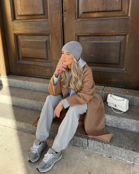 Grey tracksuit outfit, styled up for winter with a smart belted coat, new balance trainers, cosy grey hat & a Chanel classic flap bag. 

#LTKSeasonal #LTKstyletip #LTKeurope