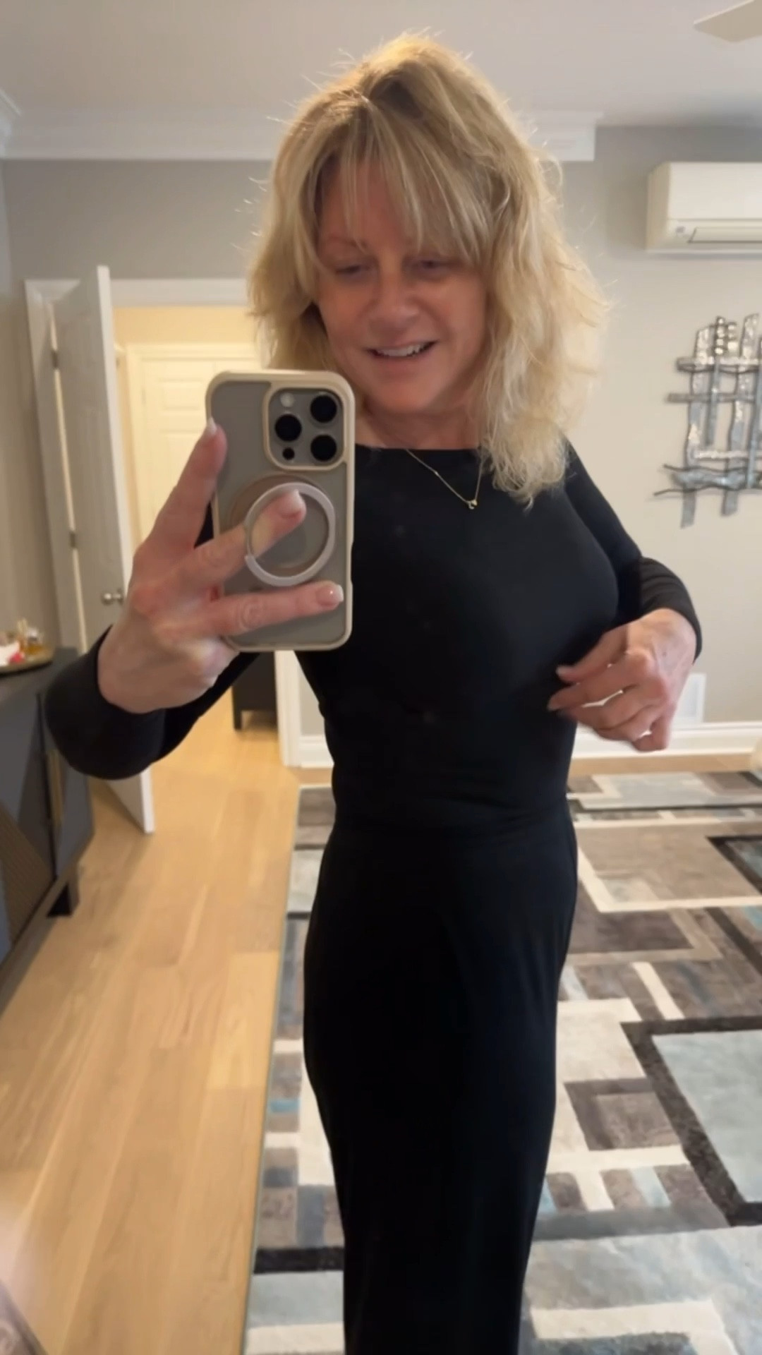 Aritzia is my go-to for basic layering tops, and this one might be my favourite yet. The fitted waistline feels so elevated — not too long to bunch up, not too short to show skin. Perfect length, beautiful fabric. I wash it cold and let it air dry… easy.

#LTKover50style #LTKcanada #LTKstyletip