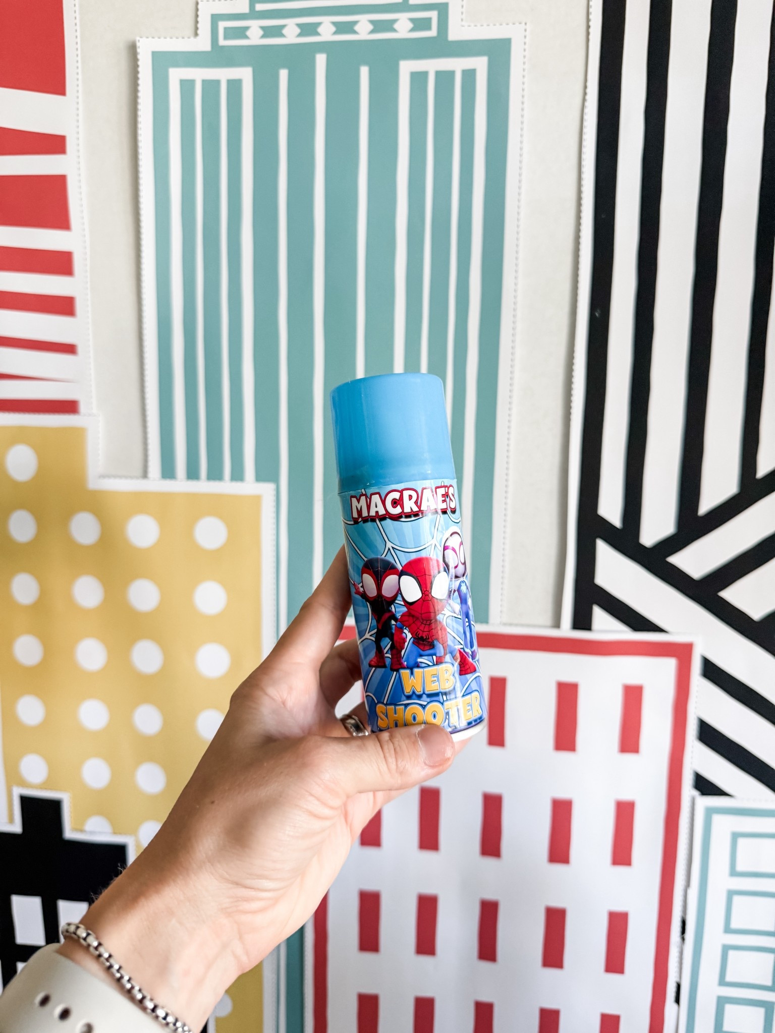 Spider-Man Birthday Party Activity Idea - silly string web shooters, custom label for silly string can and skyscraper super hero backdrop 

#LTKKids #LTKParties