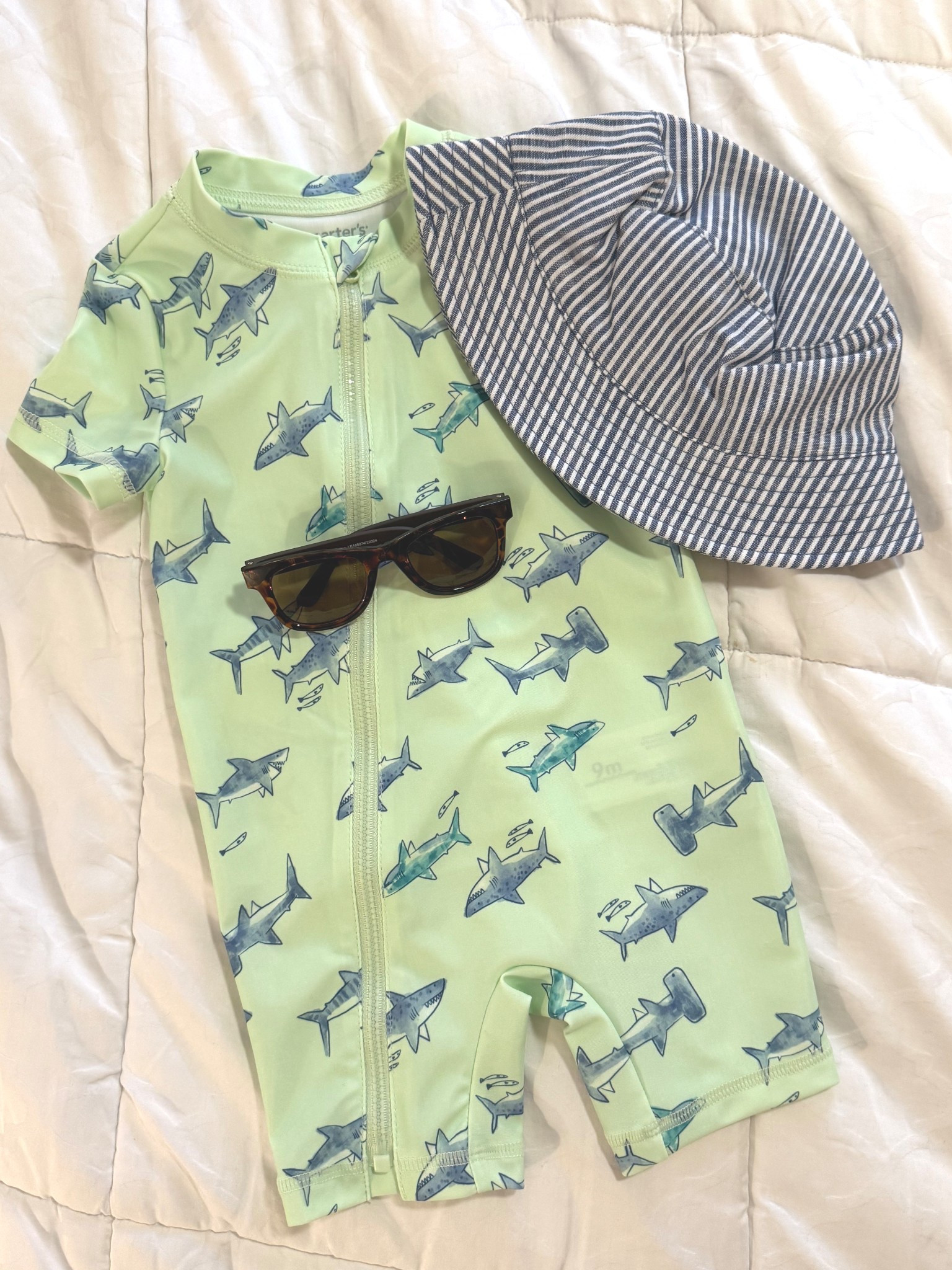 Baby boy swim ootd 🩳

Swim suit rash guard baby sunglasses bucket hat sun hat sunnies bright colored bathing suit for boys 

#LTKBaby #LTKSummerEdit #LTKSwim