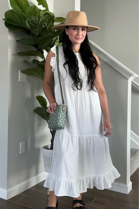 Travel outfit idea
I love this white linen dress with frills, that works with these affordable Target sandals.

#blacksandals #whitedress #vacationoutfit #weddingguest #resortwear #valentinesday 

#LTKstyletip #LTKtravel #LTKfindsunder50