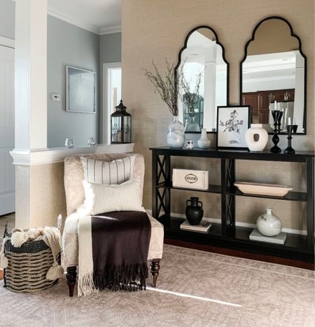 Winter refresh console table styling. Black console table, black scallop mirrors, neutral area rug on sale at Wayfair! New decor, black candleholders, cozy and soft black and cream fringe throw blanket, textured throw pillow, basket, neutral vases, black vase, wood bowl. Crate & Barrel, Target, Kirkland’s Home, Amazon, Walmart. Home decor accessories, interior styling, design. Free shipping .

#LTKFind #LTKhome #LTKsalealert