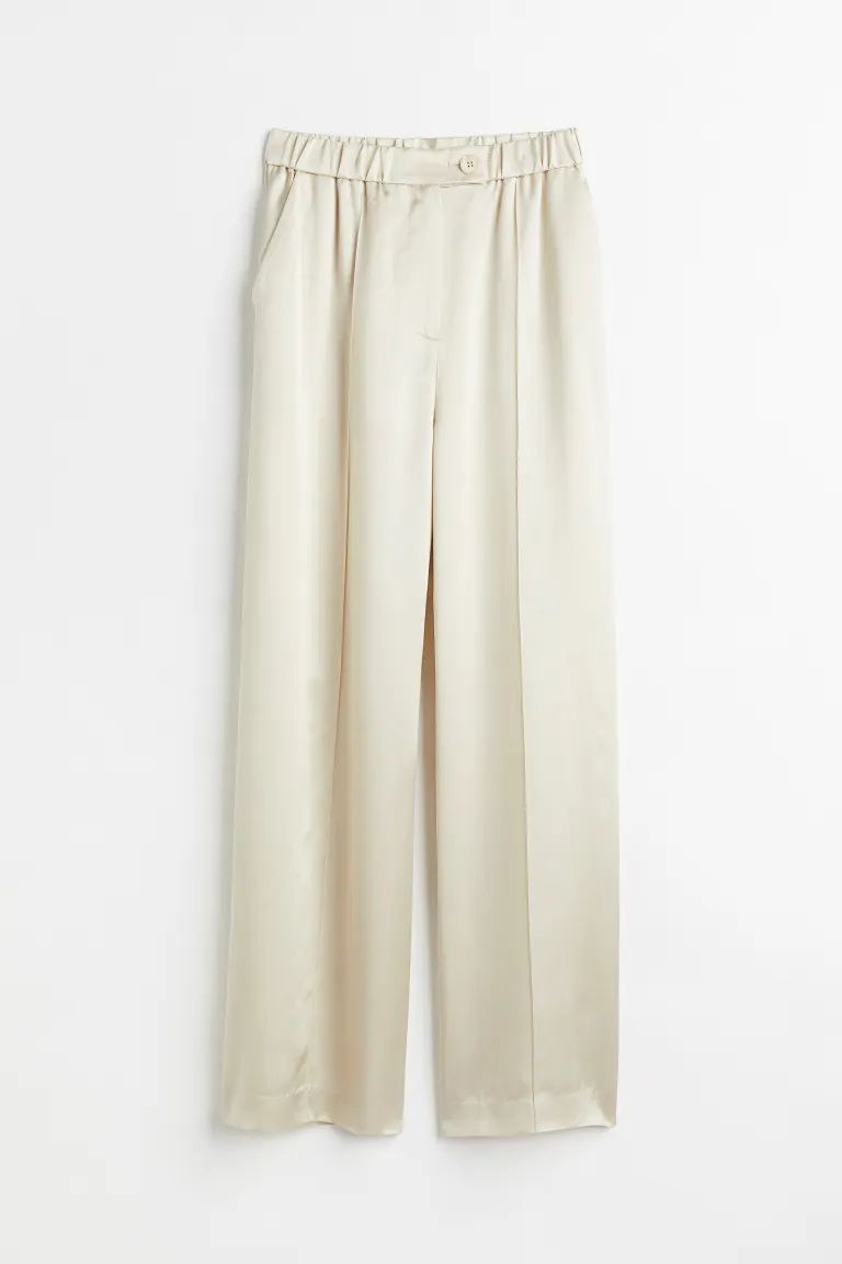 Tailored trousers in softly draping satin made from a silk blend. Regular waist with covered elas... | H&M (UK, MY, IN, SG, PH, TW, HK)