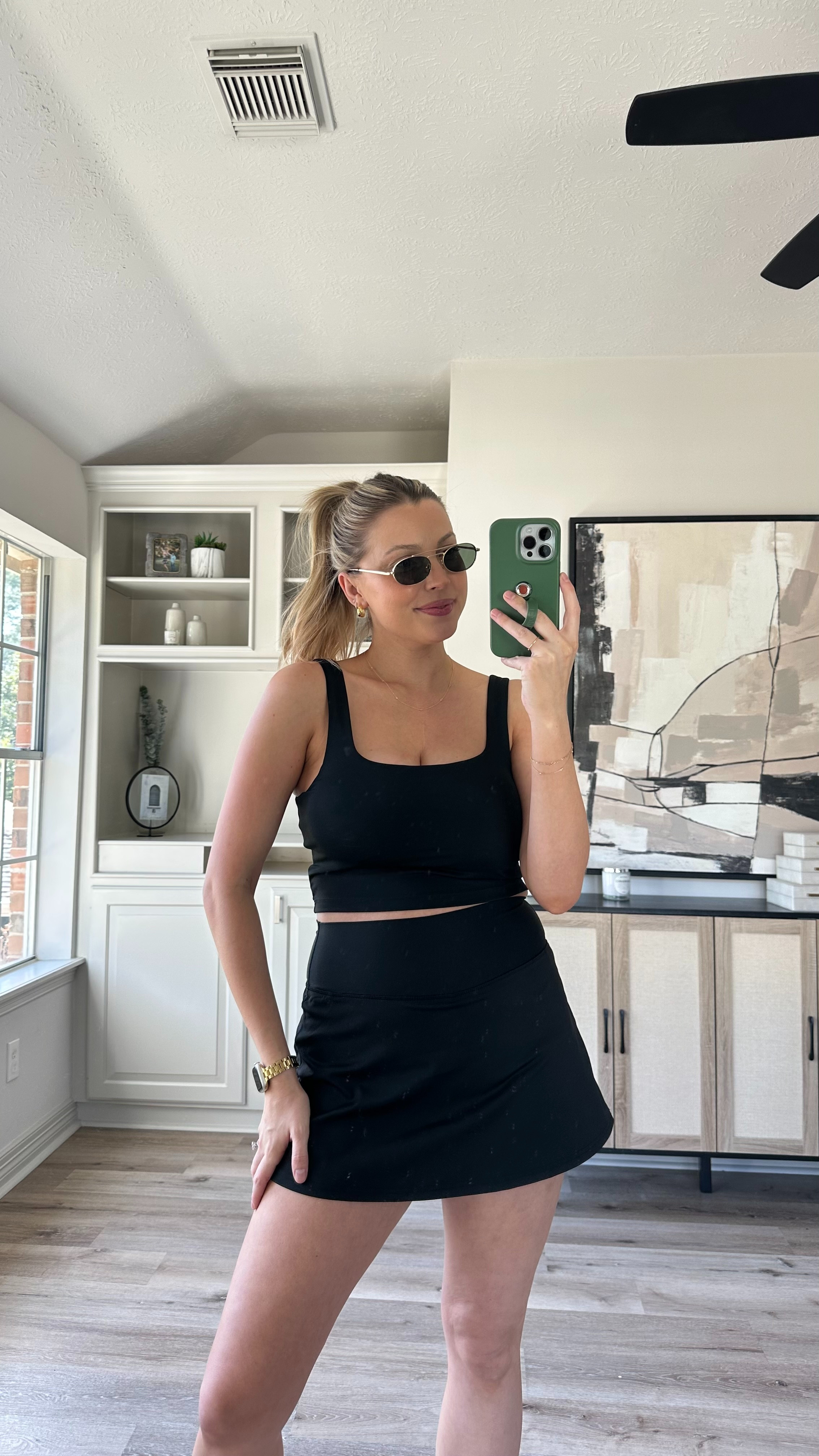 Casual Spring Outfit | Can't go wrong with a black on black outfit, it looks so chic. Wearing size M in the skirt and sports bra tank. Sneakers fit tts. 

 

#LTKActive #LTKStyleTip