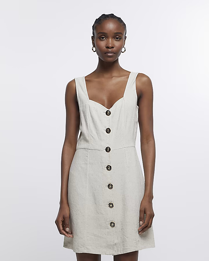 Stone button mini dress with linen | River Island (UK & IE)