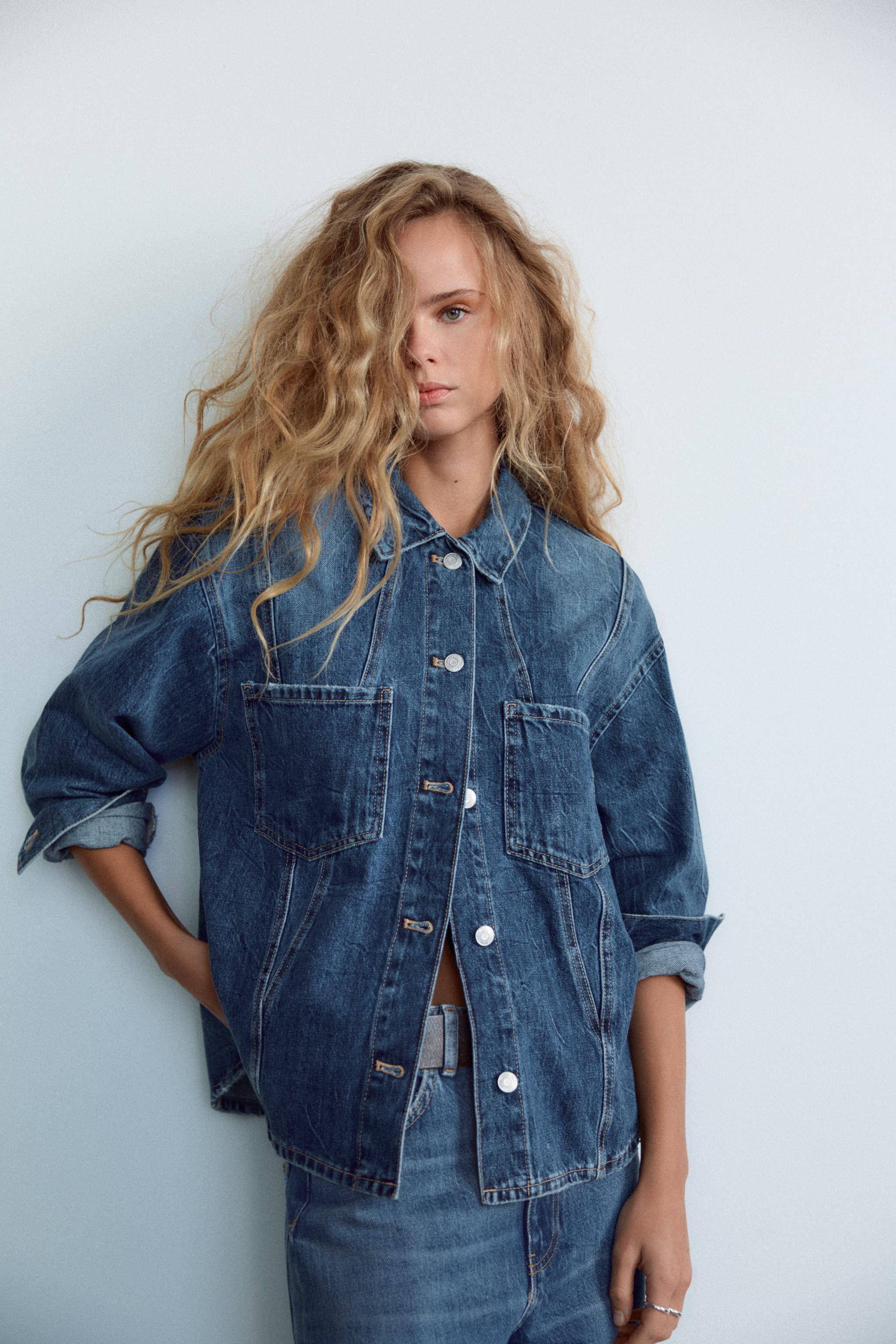 Overshirt with lapel collar and long sleeves with cuffs. Front patch pockets. Front metal button ... | Zara US