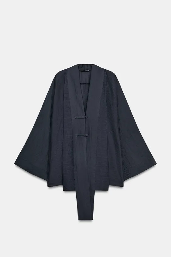 ZARA WOMAN COLLECTIONShirt made from a viscose blend yarn. Featuring a V-neck and long sleeves. S... | Zara IT